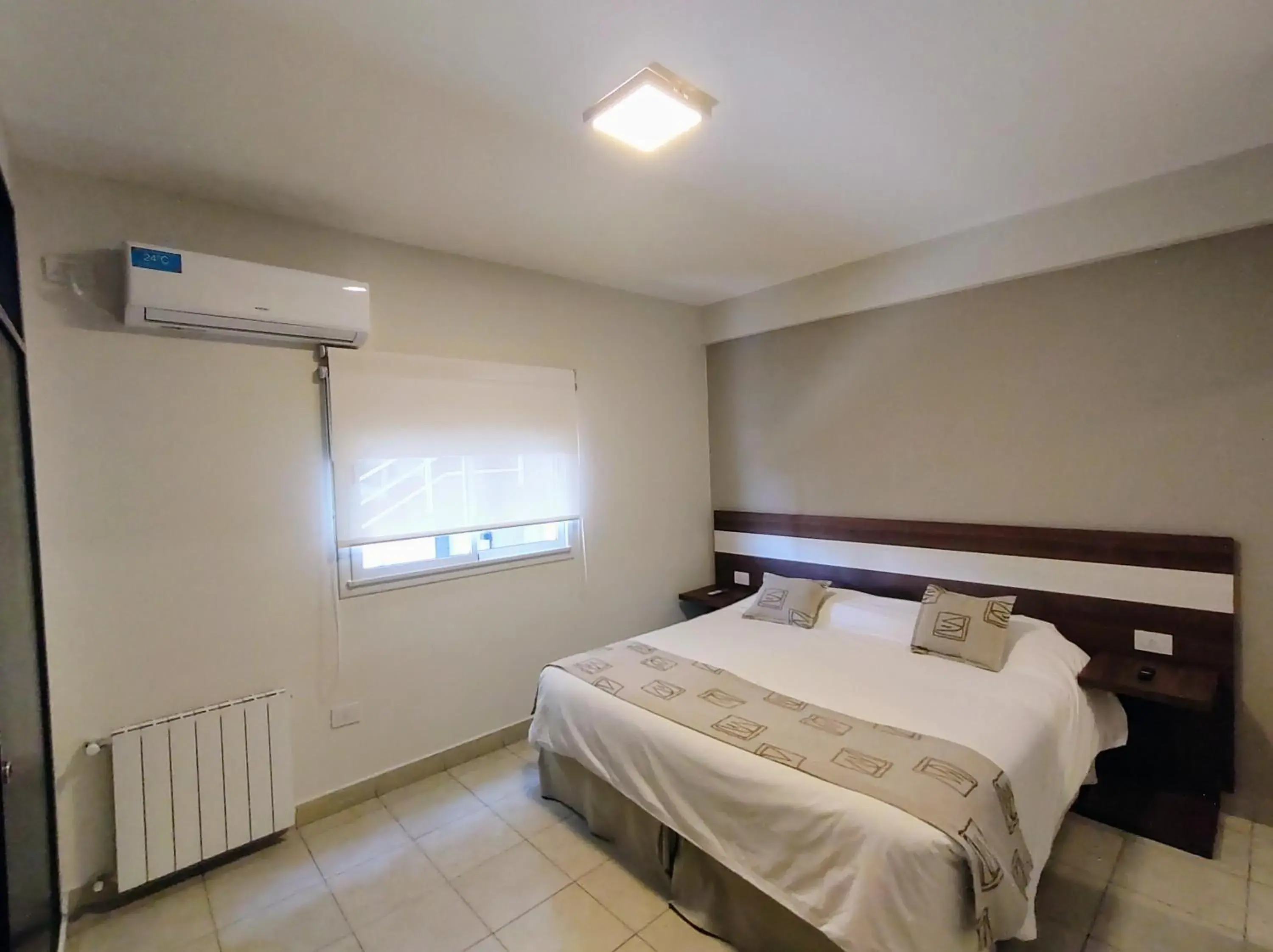 air conditioner, Bed in Urquiza Suites Salta air conditioner, Bed in Urquiza Suites Salta