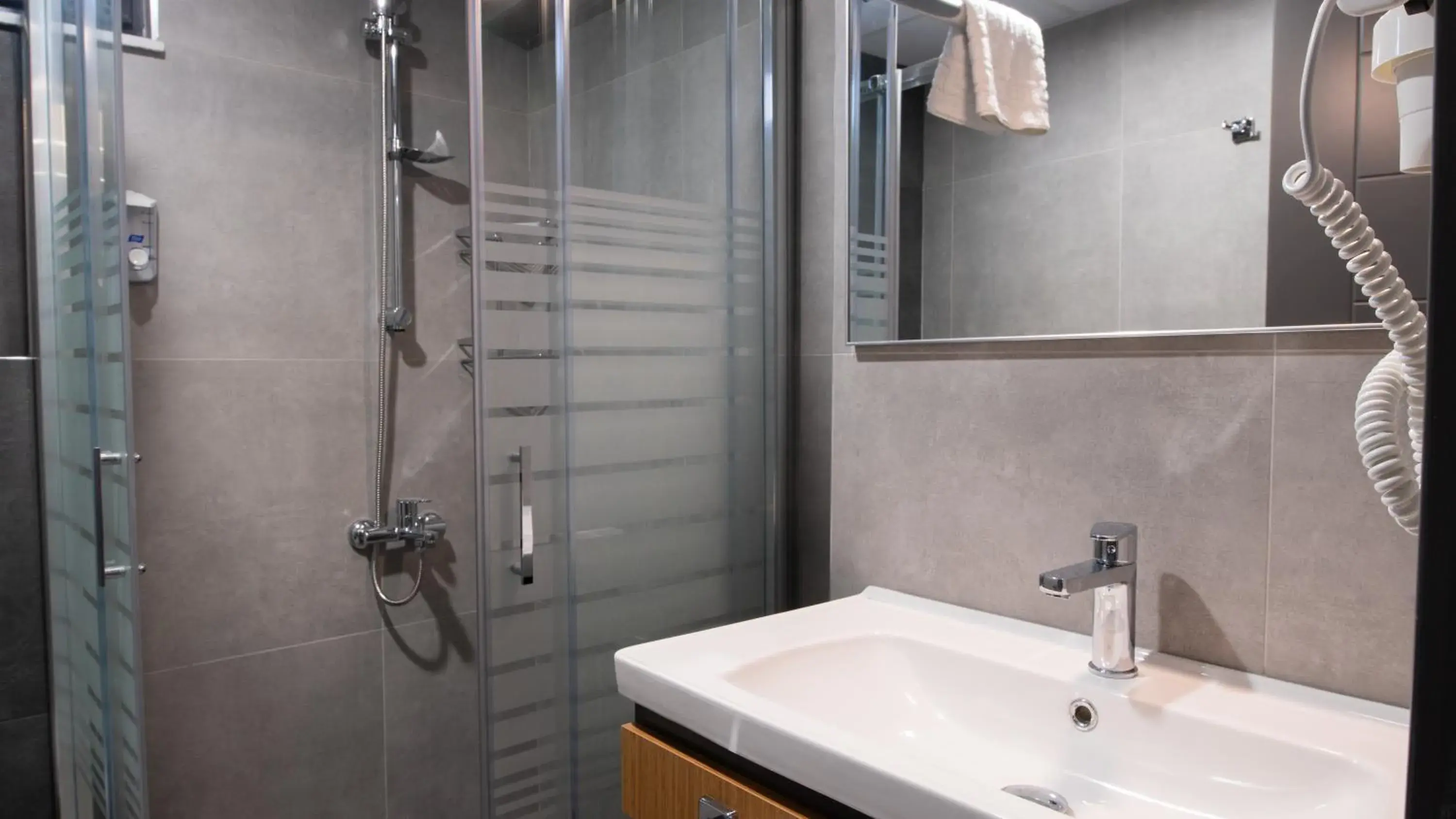 Bathroom in OPERA SUITES Apart Hotel Bathroom in OPERA SUITES Apart Hotel