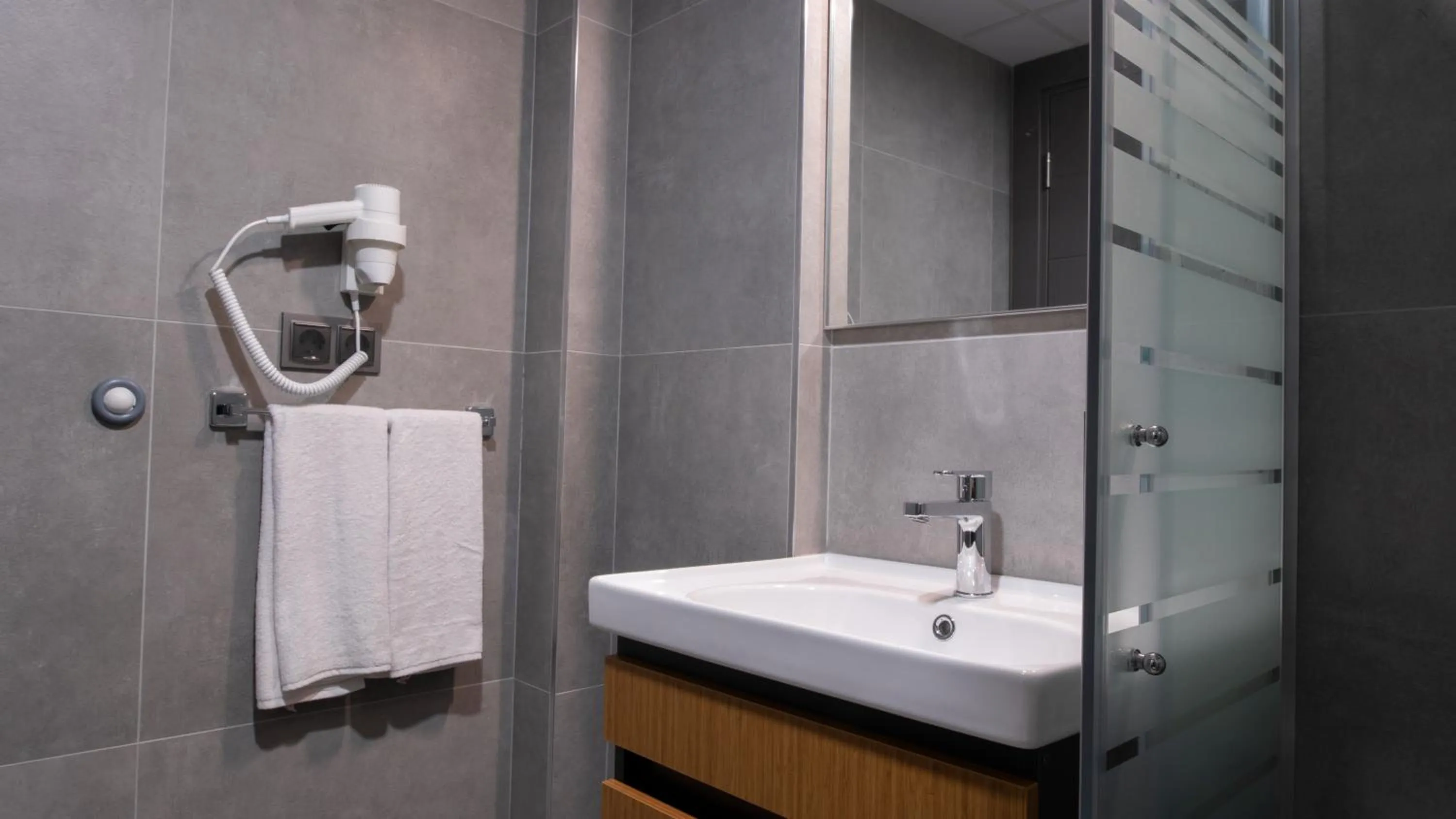 Bathroom in OPERA SUITES Apart Hotel