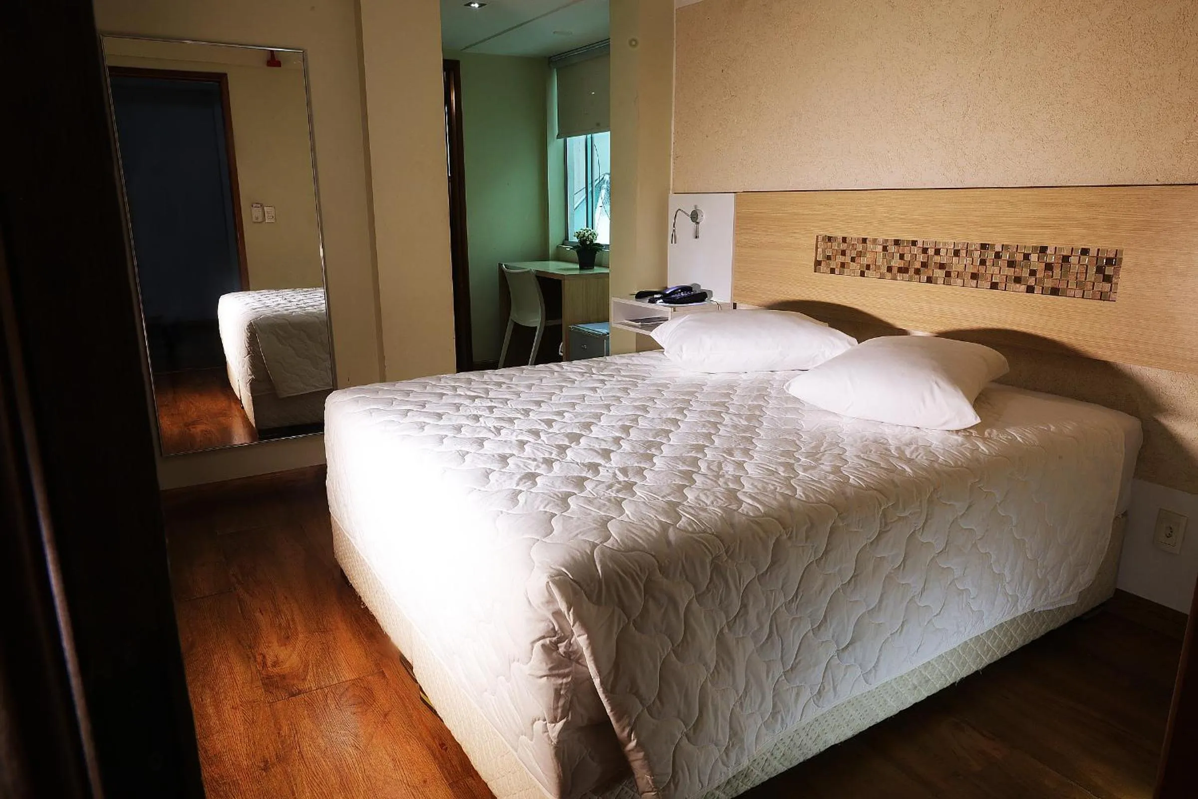 Bed in Emirates Hotel & Suites