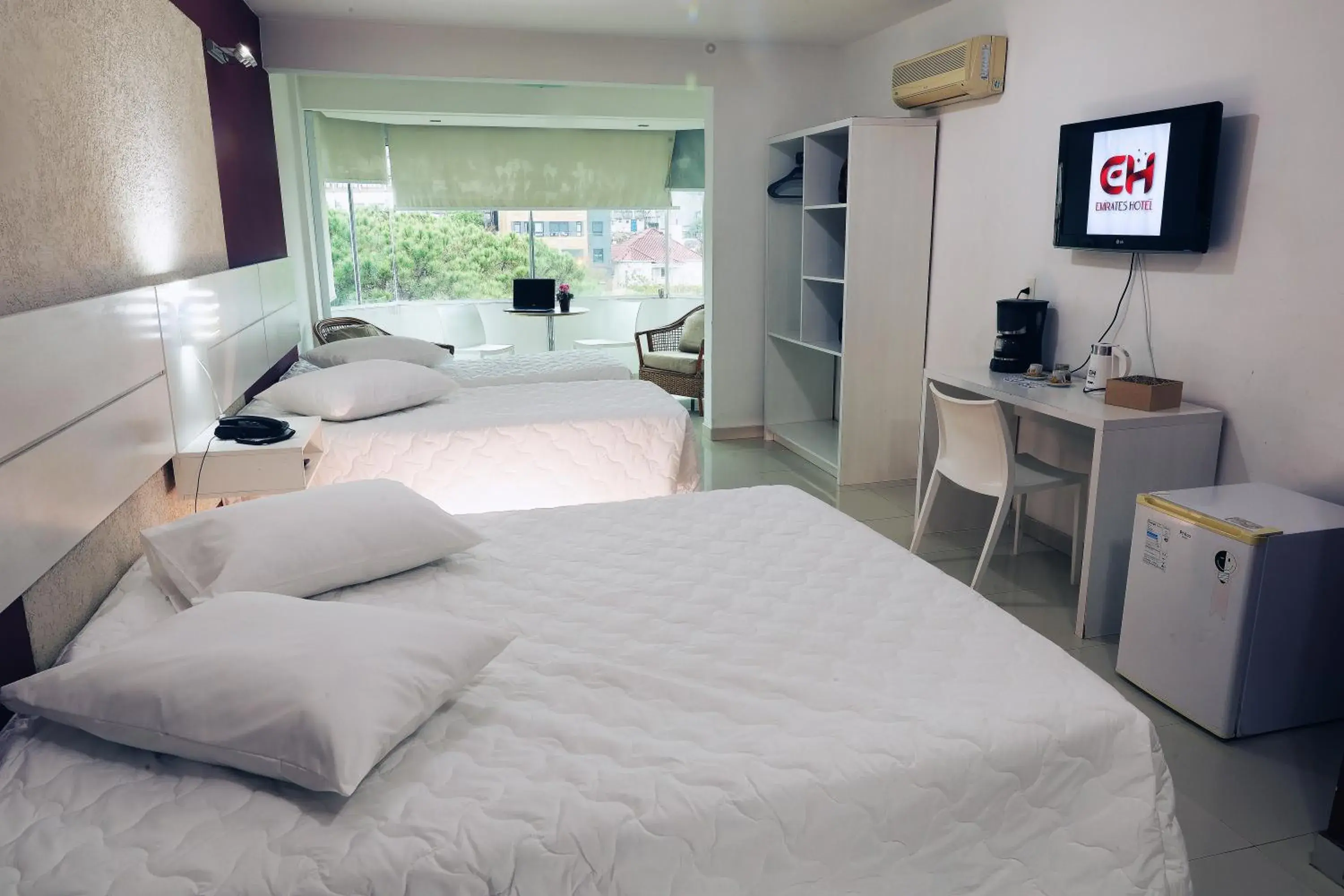 Superior Quadruple Room - single occupancy in Emirates Hotel & Suites Superior Quadruple Room - single occupancy in Emirates Hotel & Suites