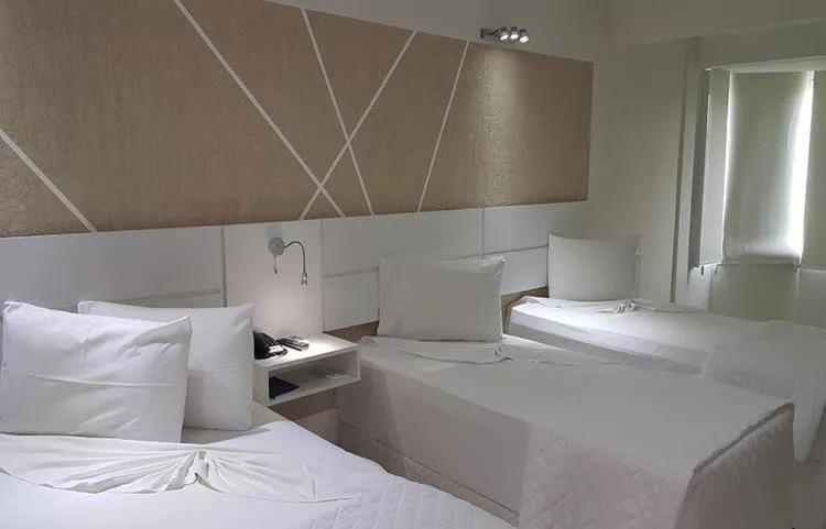 Bed in Emirates Hotel & Suites