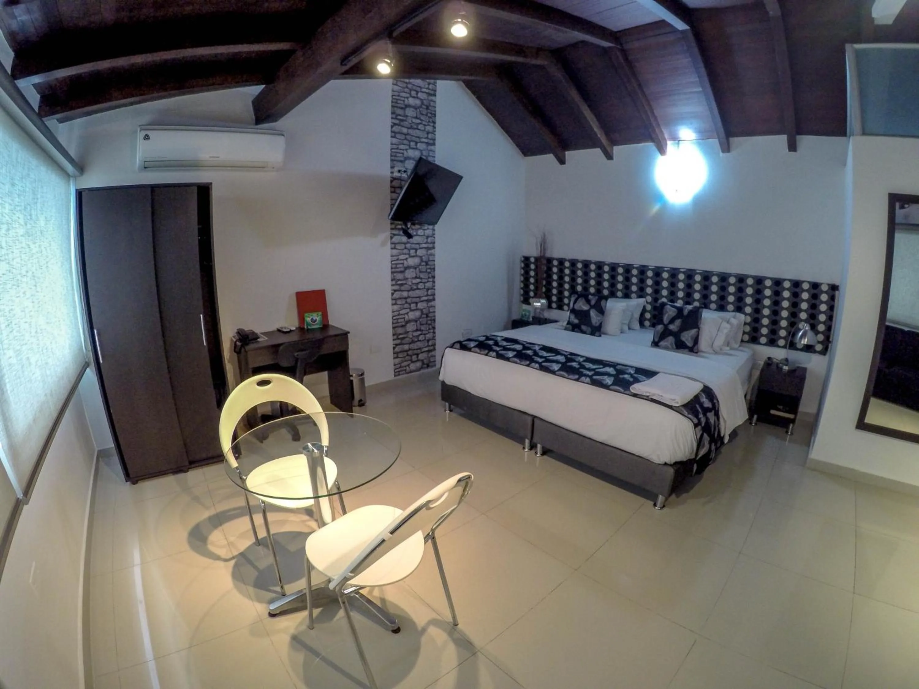 Bed in La Cabrera Hotel Boutique