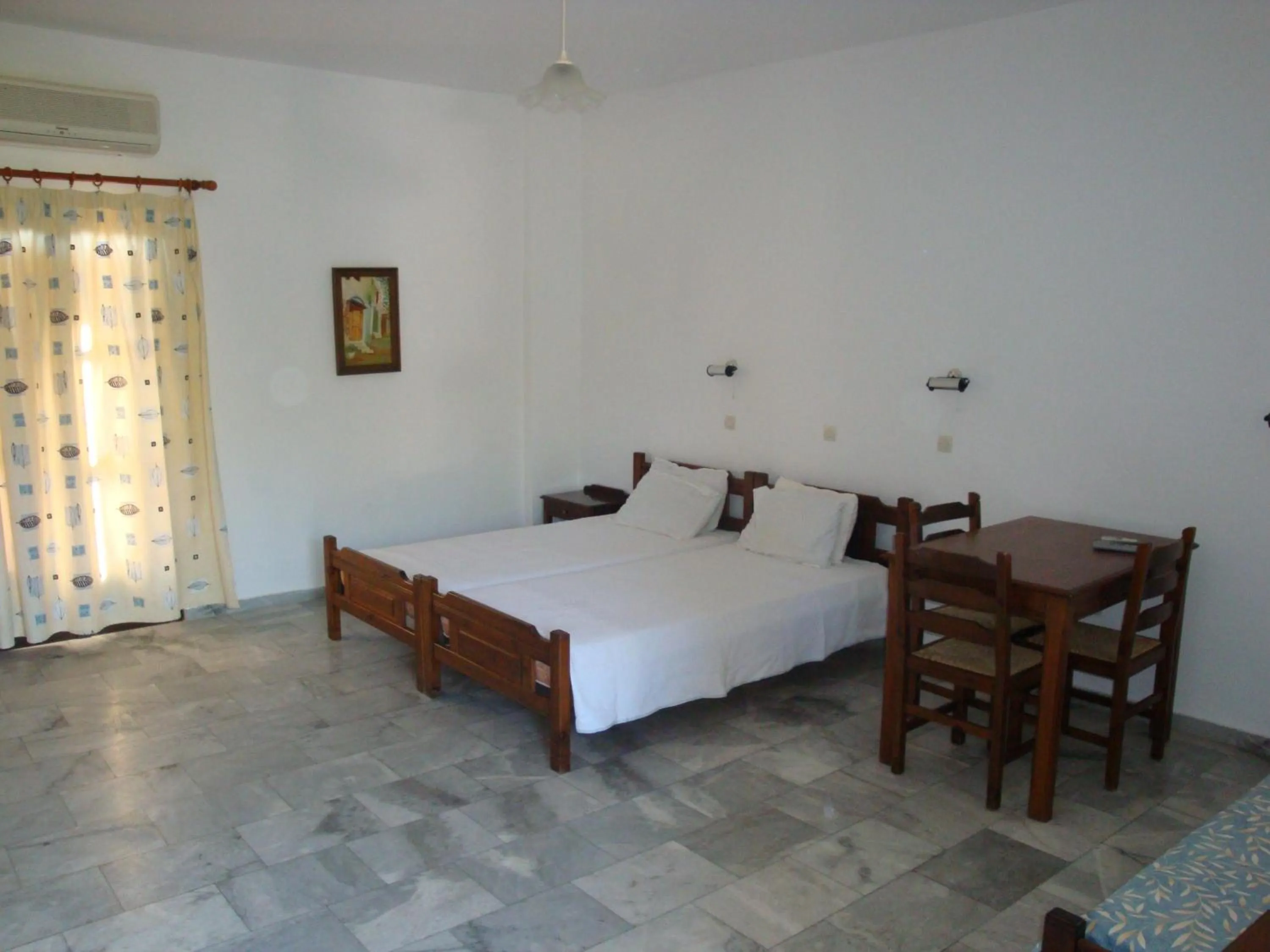 Bed in Calamon Apartments