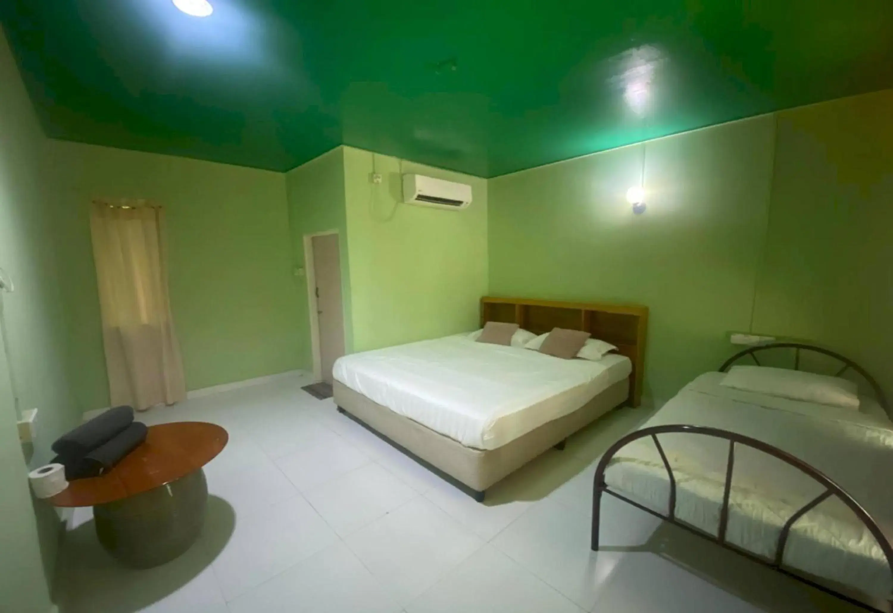 Bedroom in Hotel O Villa Thai Bedroom in Hotel O Villa Thai