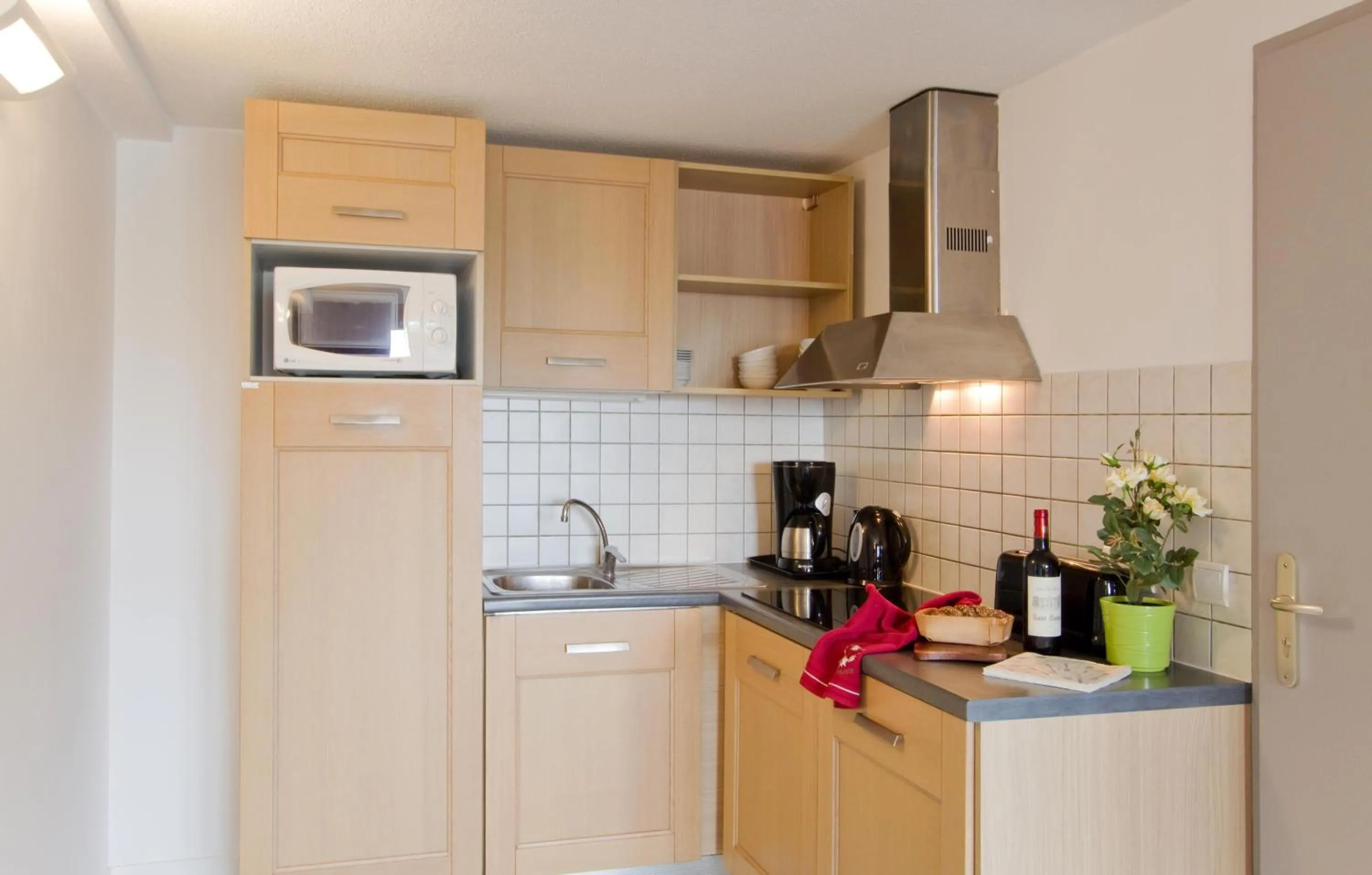 Kitchen or kitchenette in Résidence Odalys Le Pelvoux