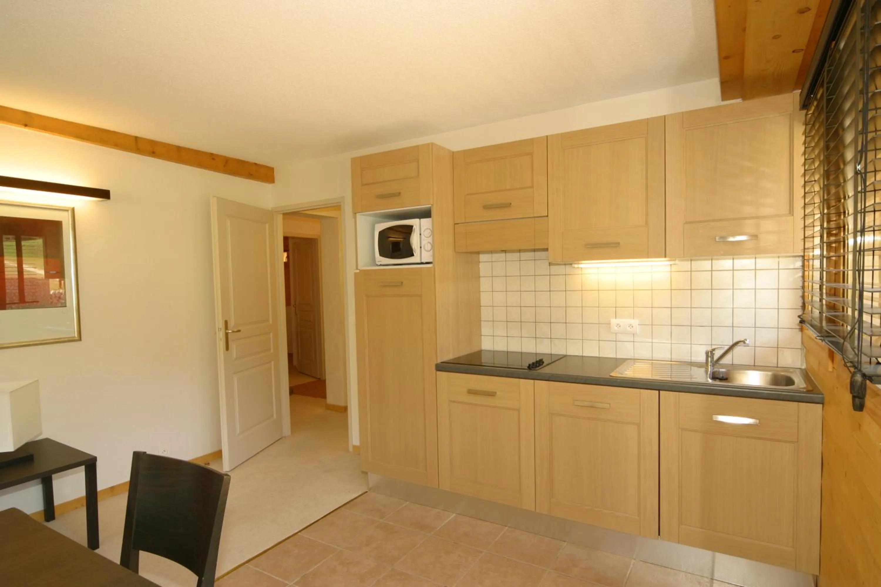 Kitchen or kitchenette in Résidence Odalys Le Pelvoux