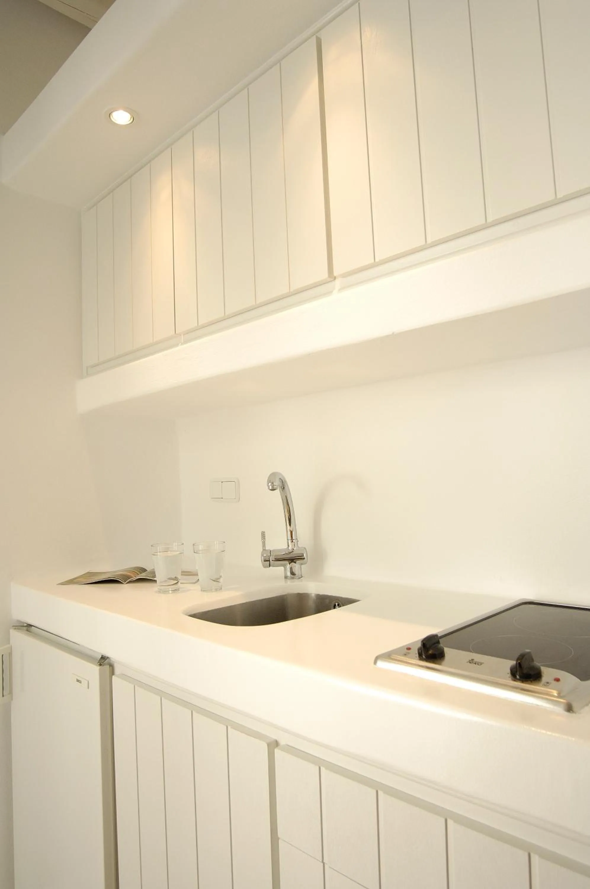 Kitchen or kitchenette in Kapetan Tasos Suites