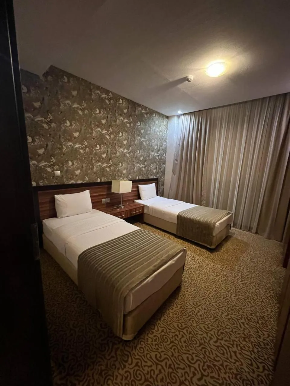 Bed in Jouhayna Hotel&Suite