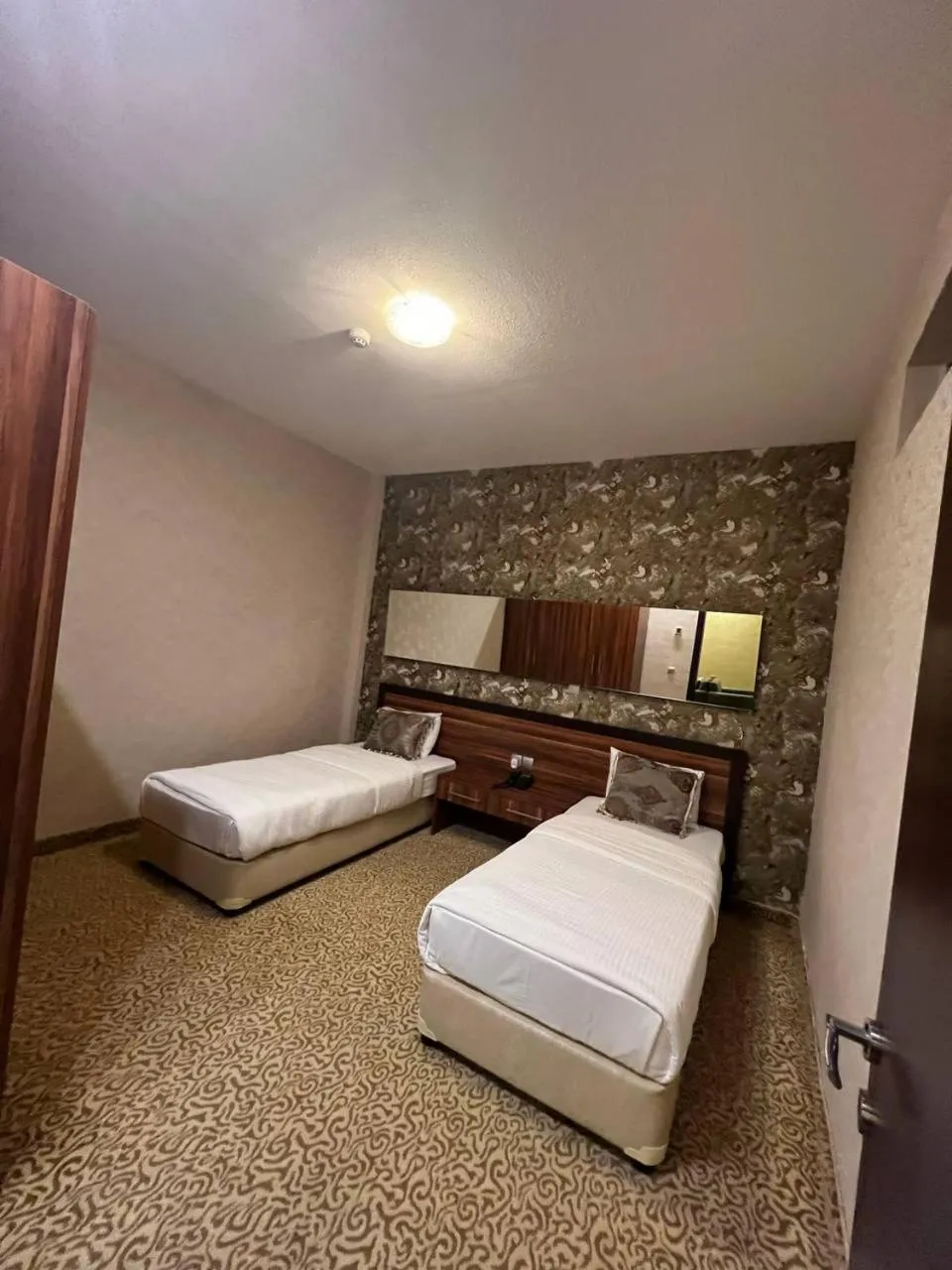 Bed in Jouhayna Hotel&Suite