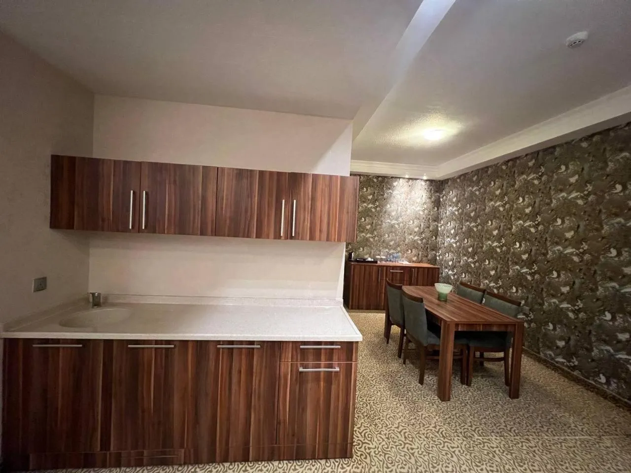 Kitchen or kitchenette in Jouhayna Hotel&Suite