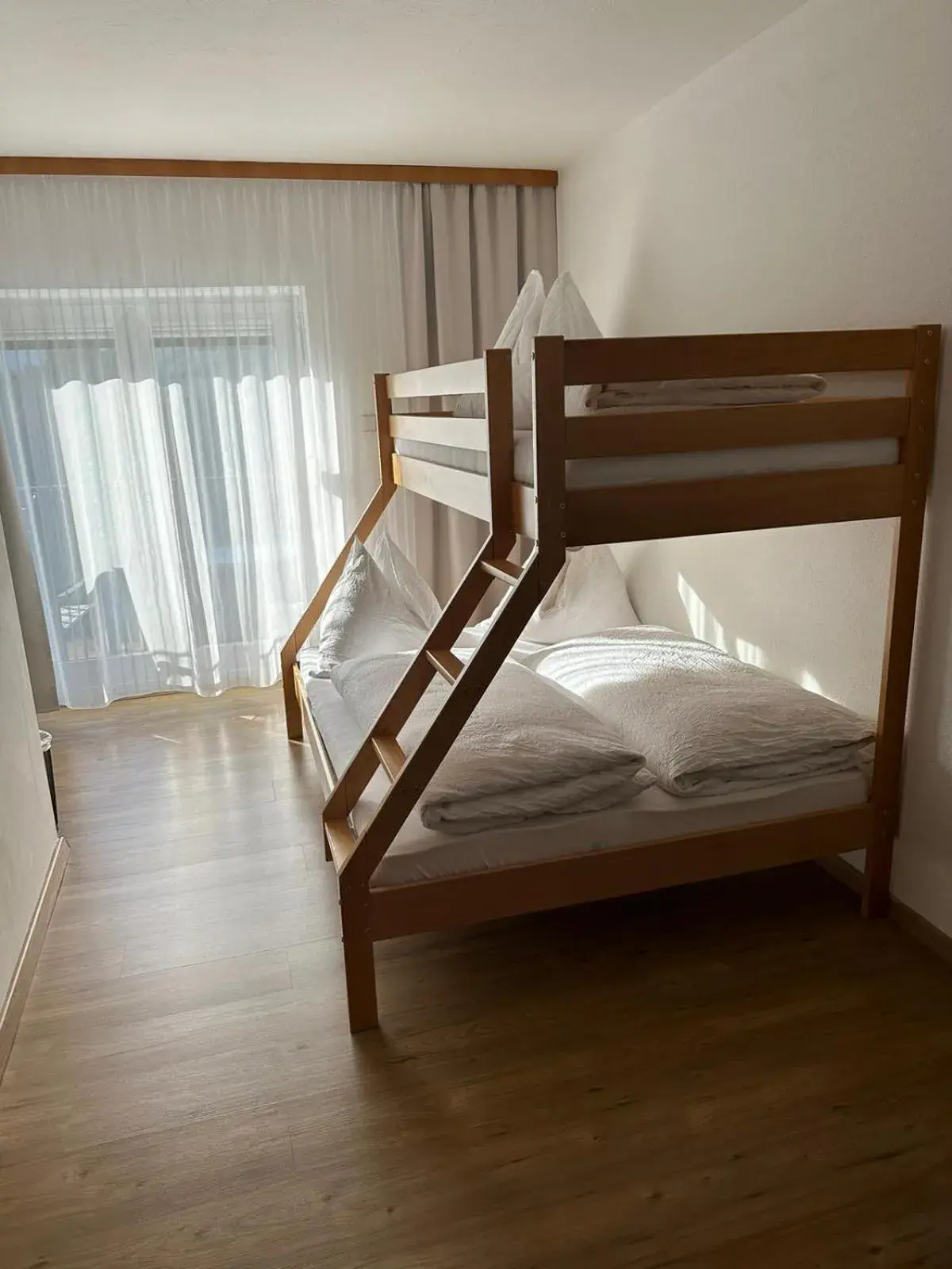 Comfort Triple Room with Shower in Pension Alpina Comfort Triple Room with Shower in Pension Alpina