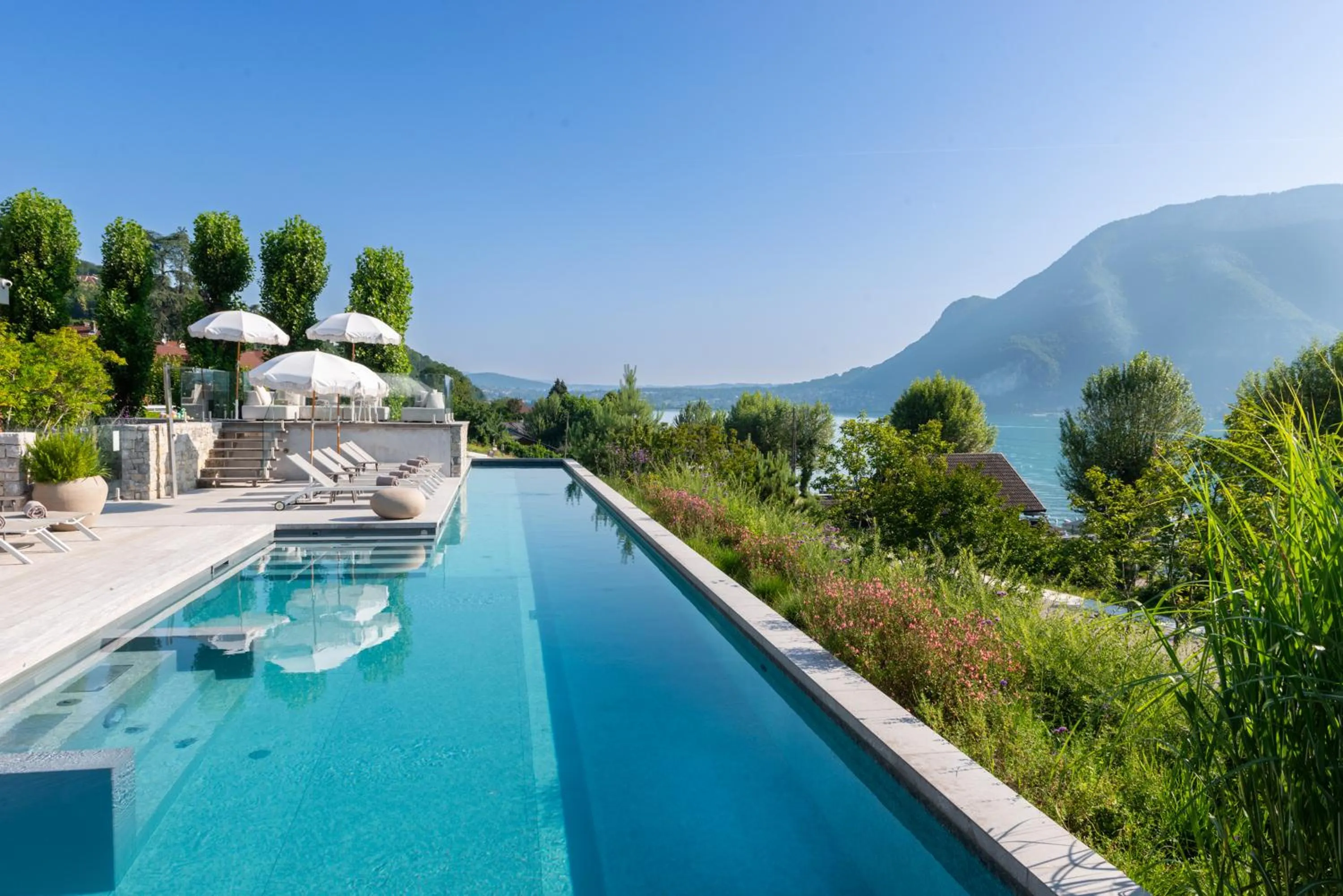 Swimming pool in Hôtel Beauregard, The Originals Relais