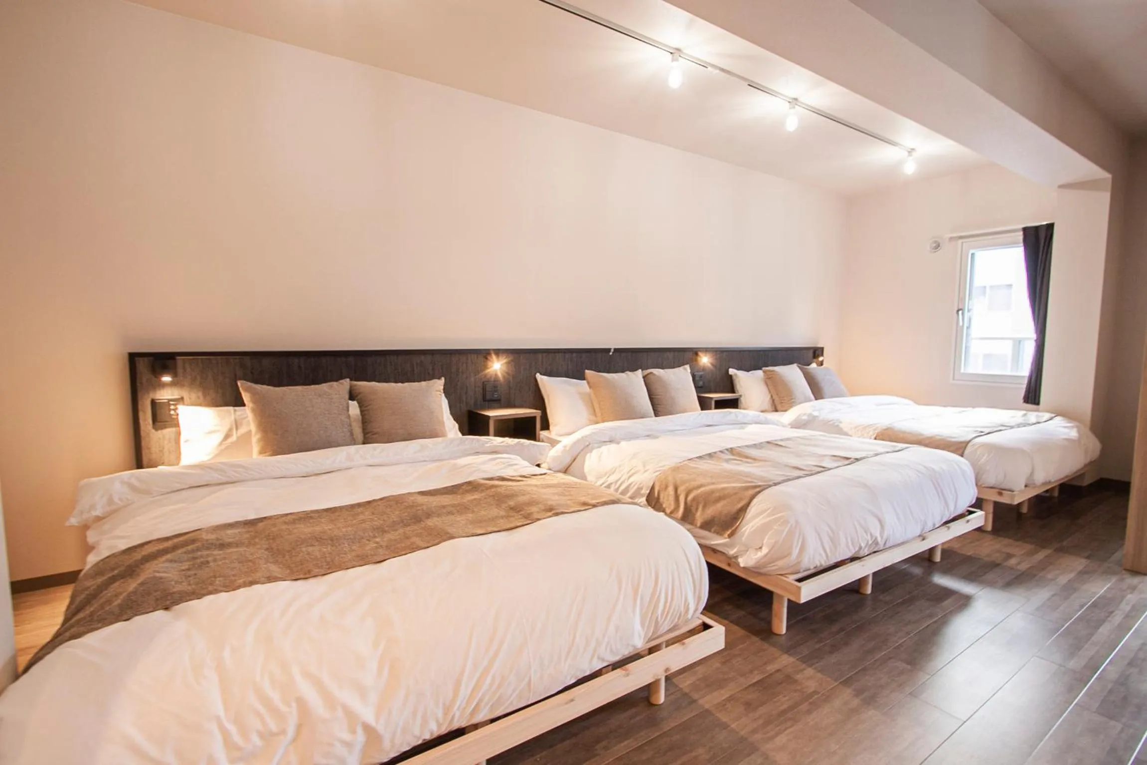 Bed in UCHI Living stay Odori 11