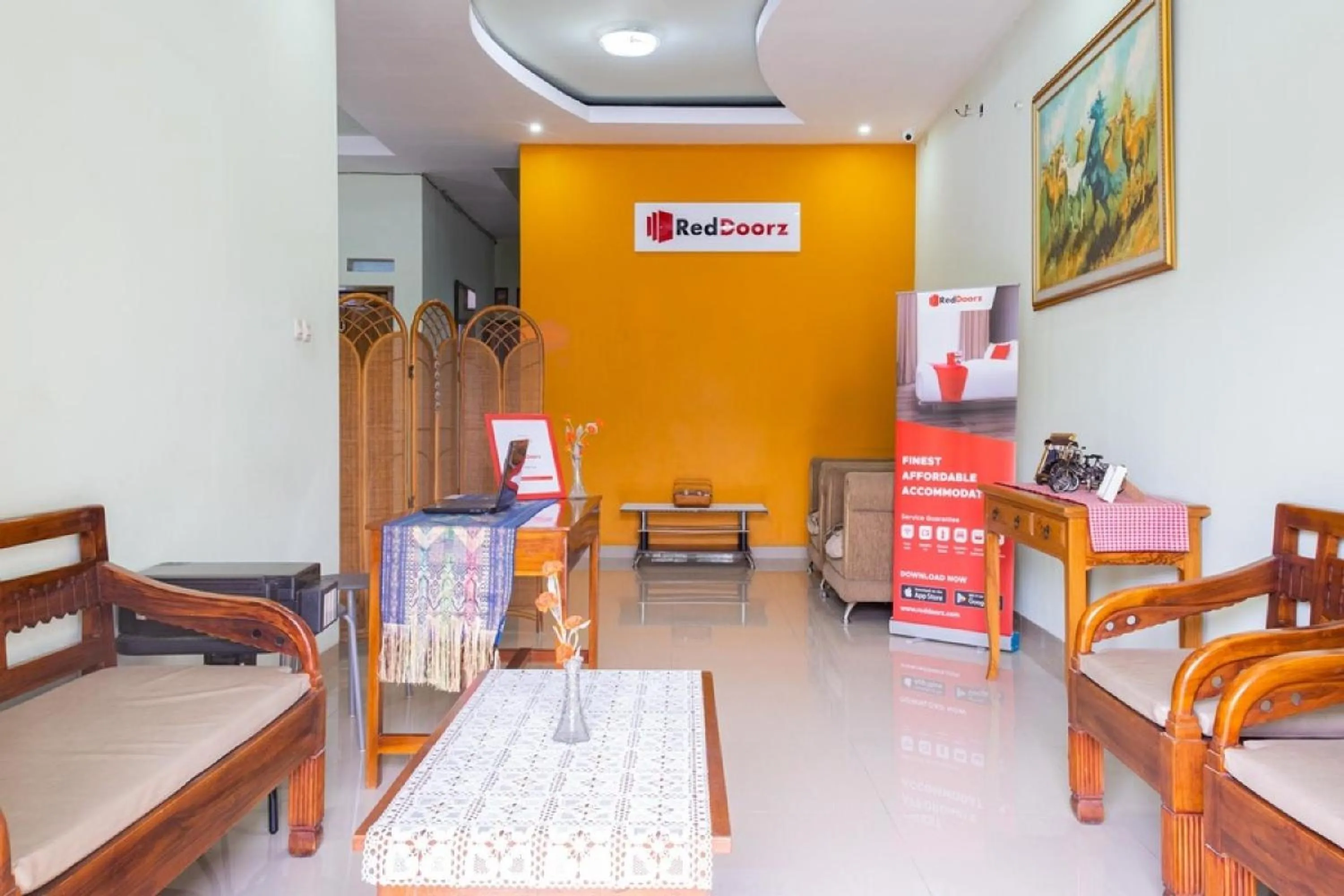 Lobby or reception in RedDoorz Syariah near Grand Kota Bintang