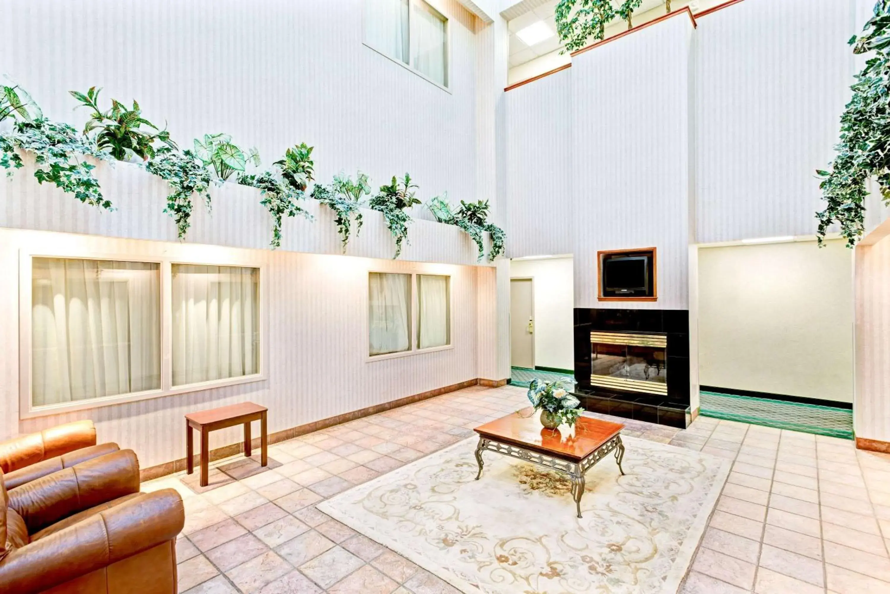 Lobby or reception in Super 8 by Wyndham Brockton Lobby or reception in Super 8 by Wyndham Brockton