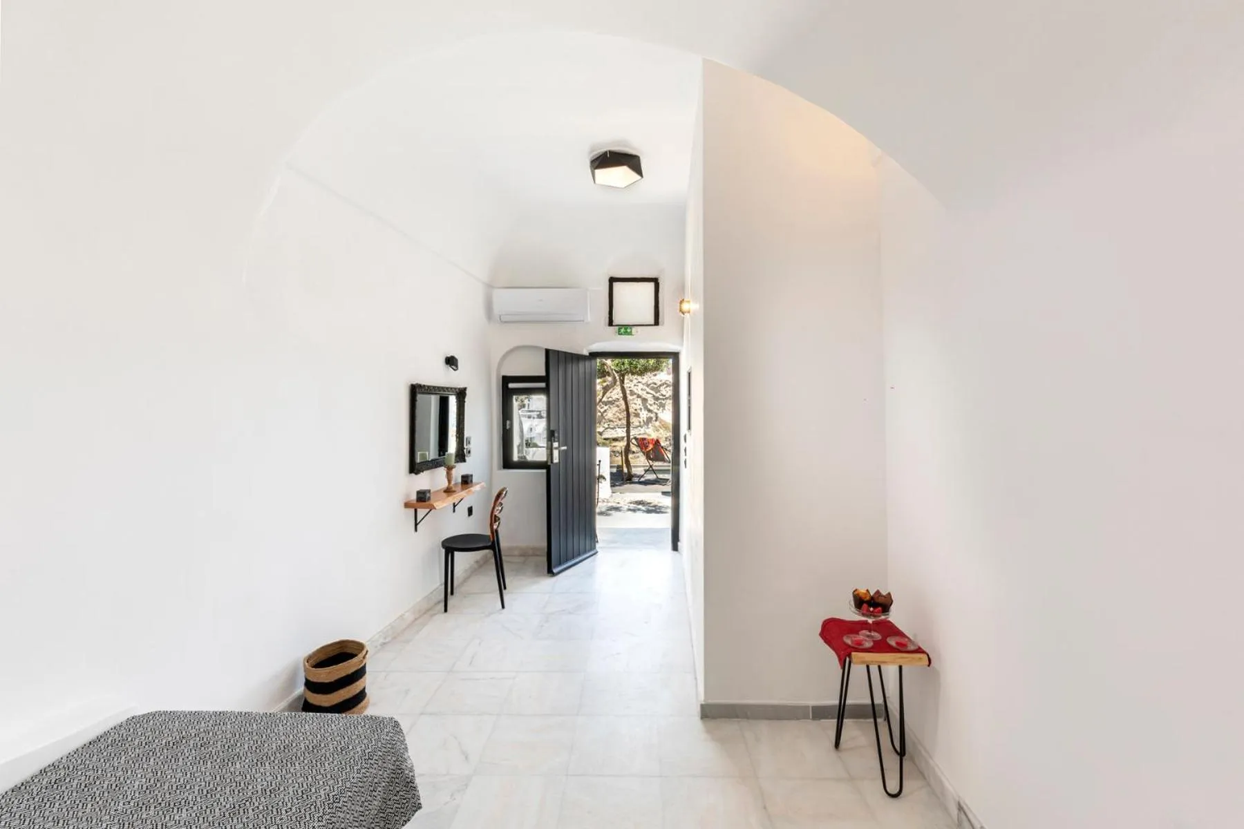 Photo of the whole room in Pearl of Caldera Oia - Boutique Hotel by Pearl Hotel Collection