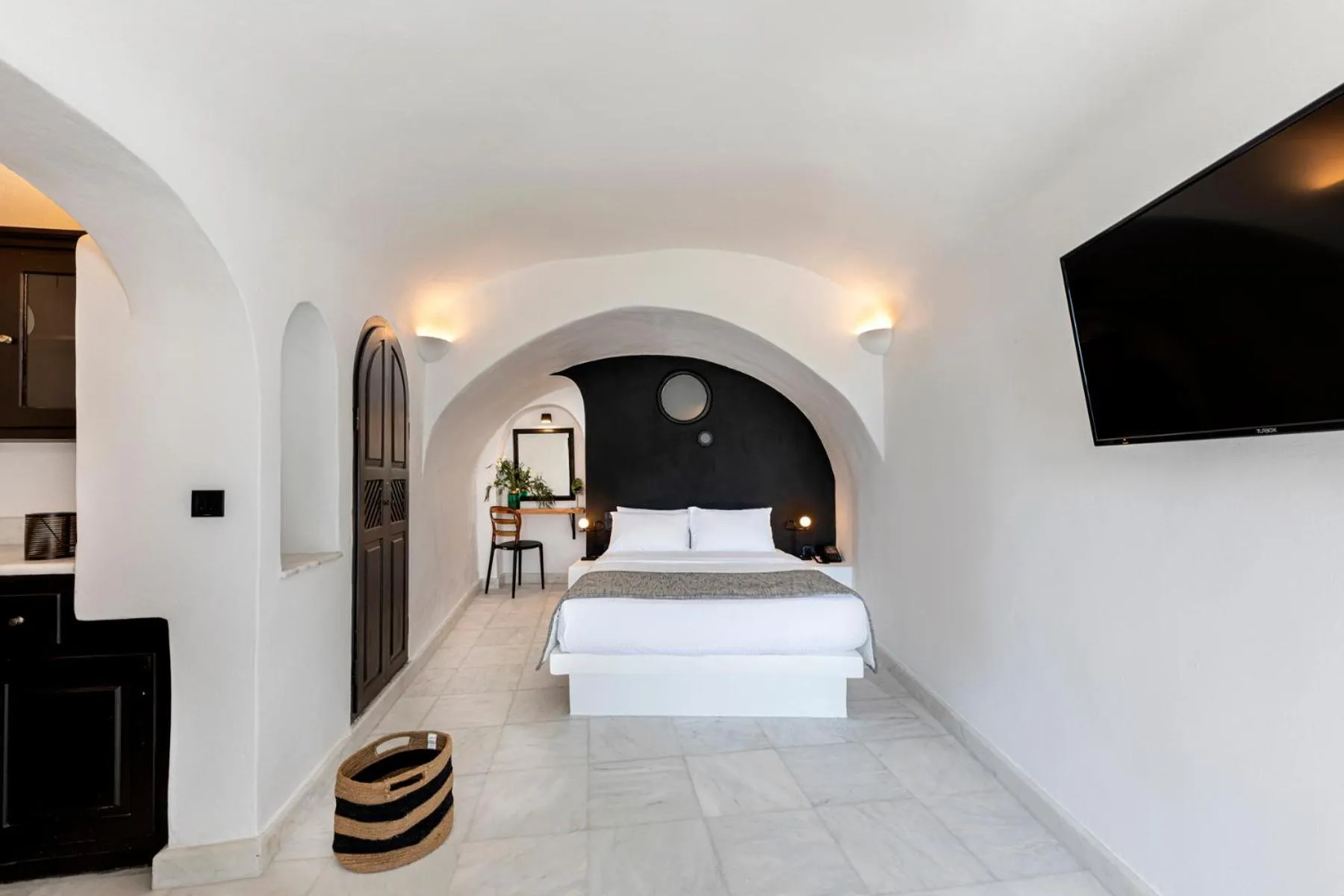 Photo of the whole room in Pearl of Caldera Oia - Boutique Hotel by Pearl Hotel Collection