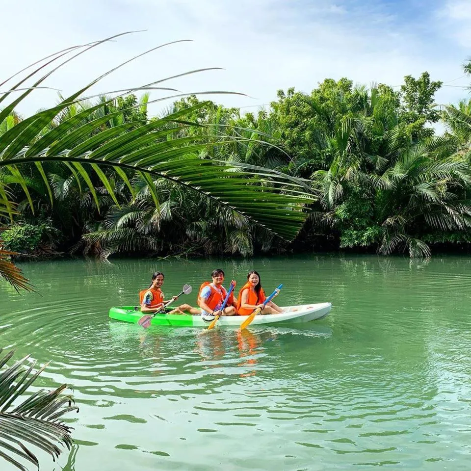 People in Lotus Sun & Waves Beach Resort