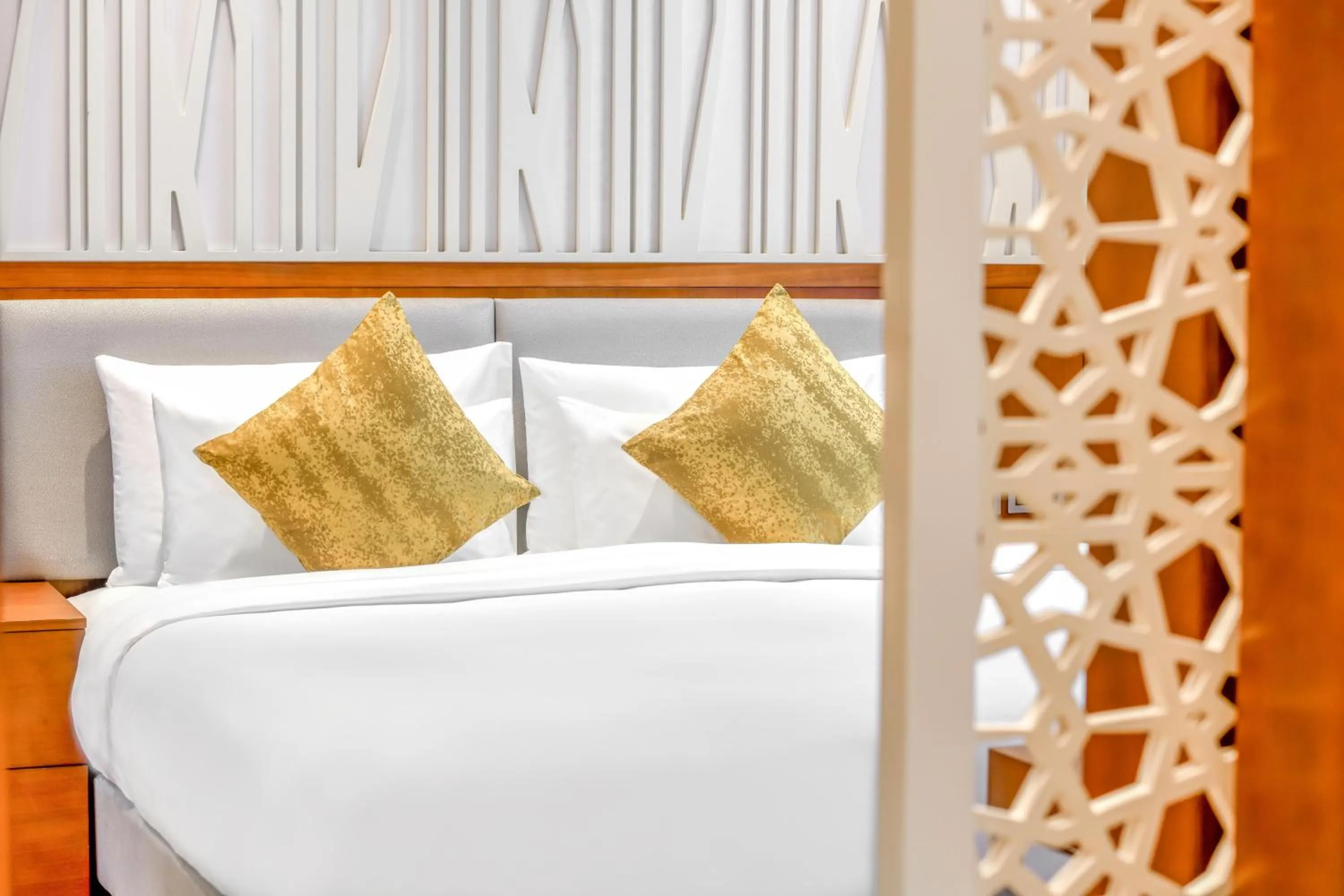 Bed in Grand Mercure Dubai City