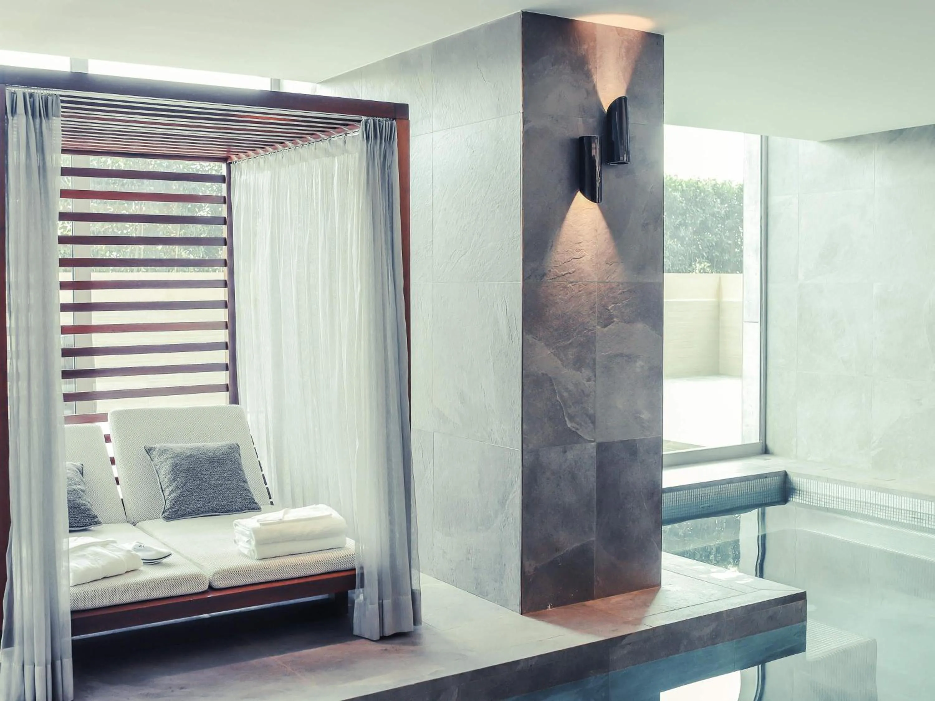 Pool view, Bed in Novotel Convention And Spa