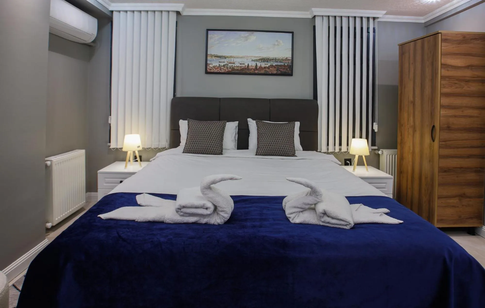 Photo of the whole room, Bed in Stone Suites