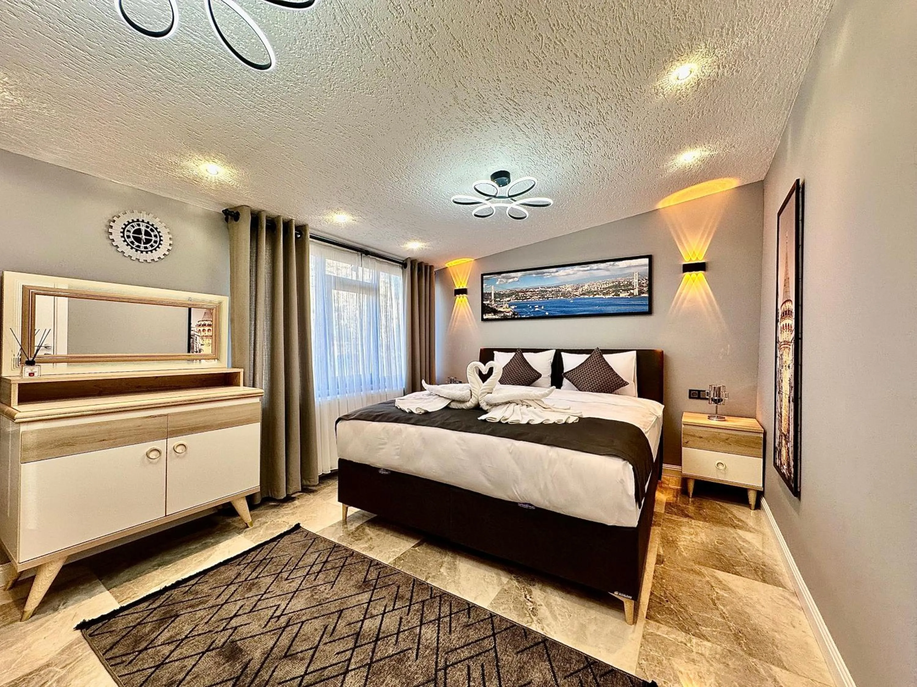 Photo of the whole room, Bed in Stone Suites