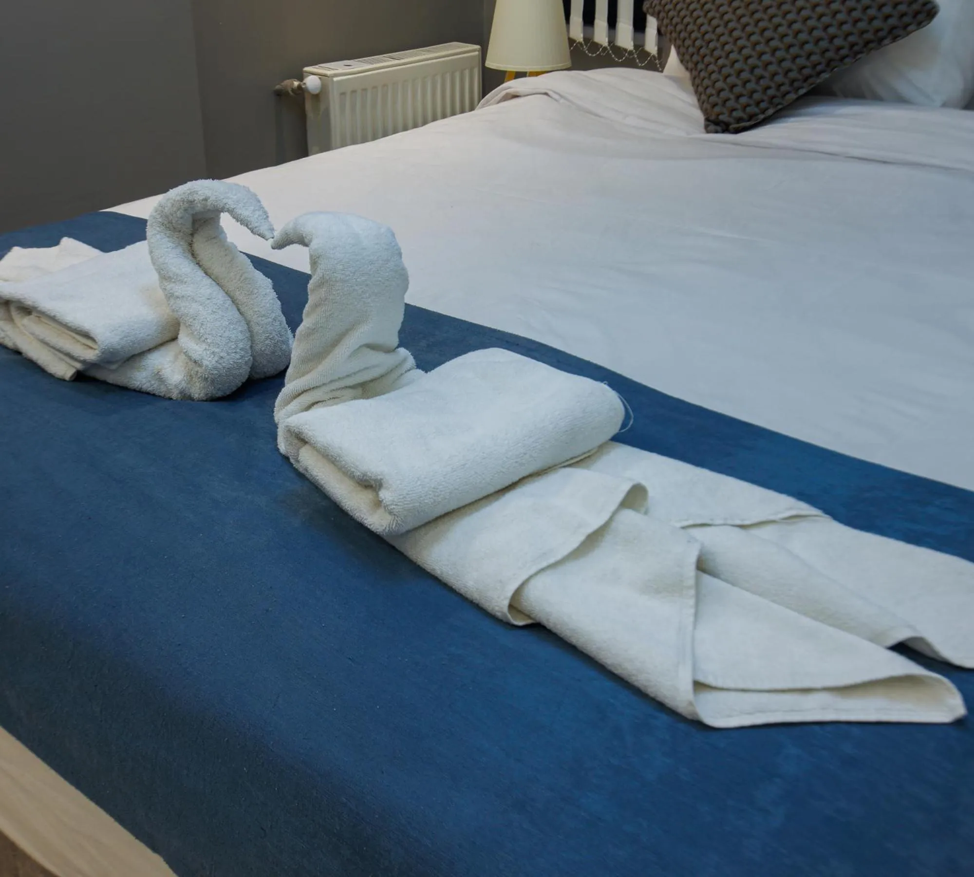 Photo of the whole room, Bed in Stone Suites