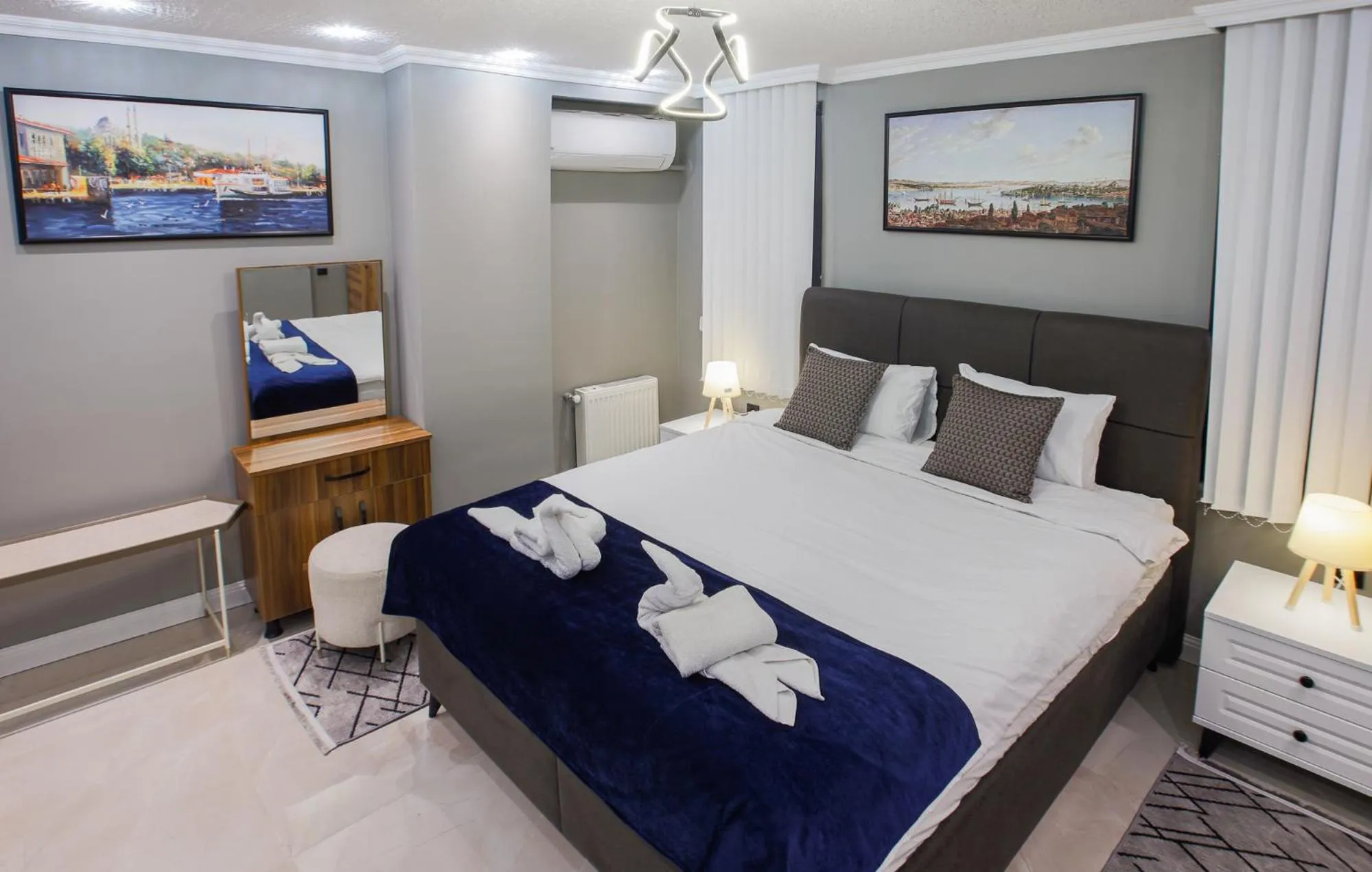 Photo of the whole room, Bed in Stone Suites