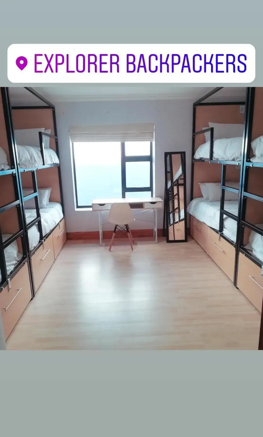 Bed in 8-Bed Mixed Dormitory Room in Explorer Backpackers Bed in 8-Bed Mixed Dormitory Room in Explorer Backpackers