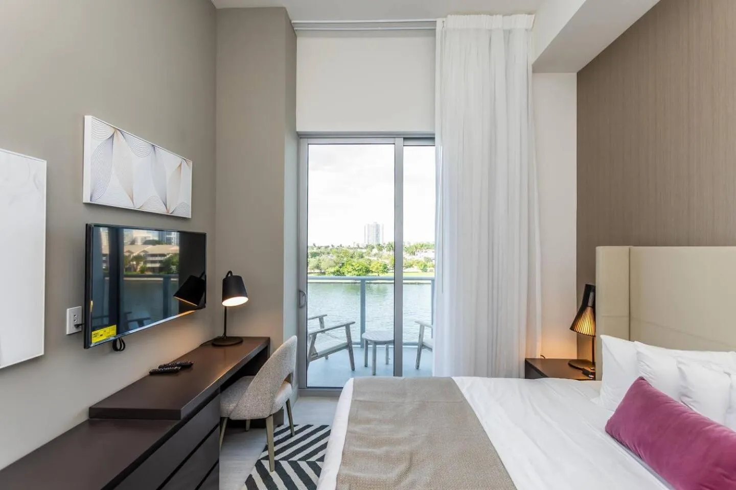 Bed in Amazing Apartments at H Beach House