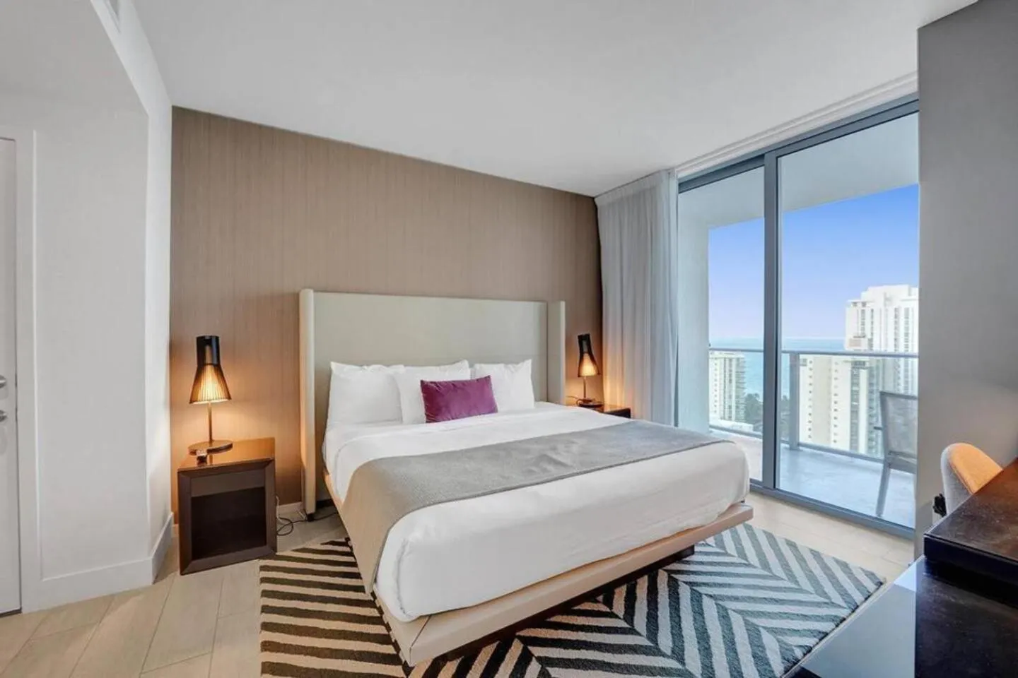 Bed in Amazing Apartments at H Beach House