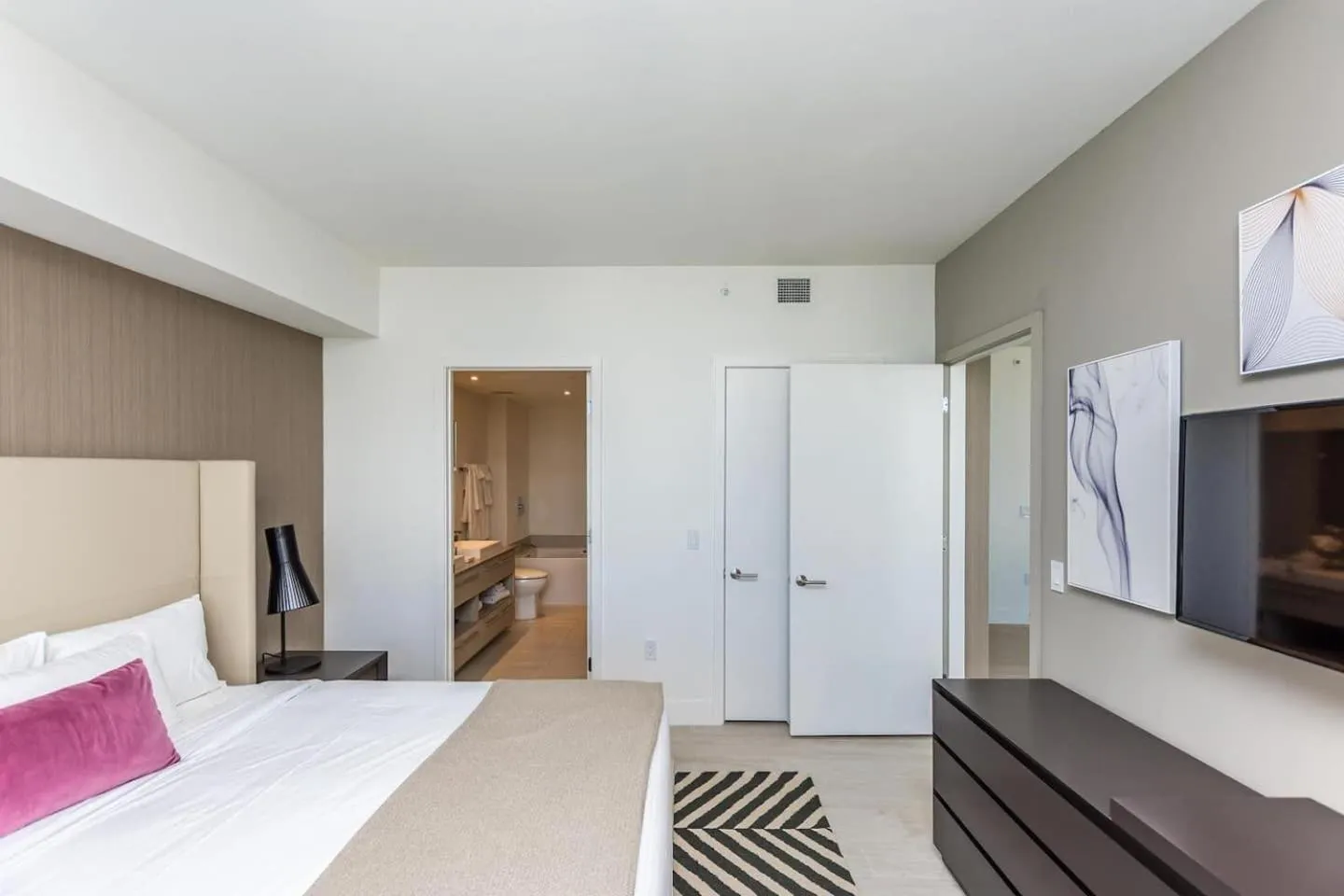 Bed in Amazing Apartments at H Beach House