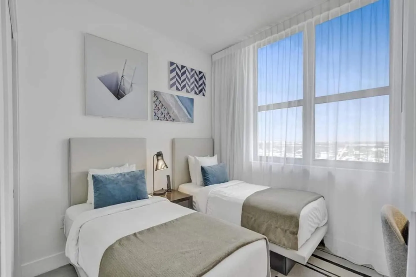 Bed in Amazing Apartments at H Beach House