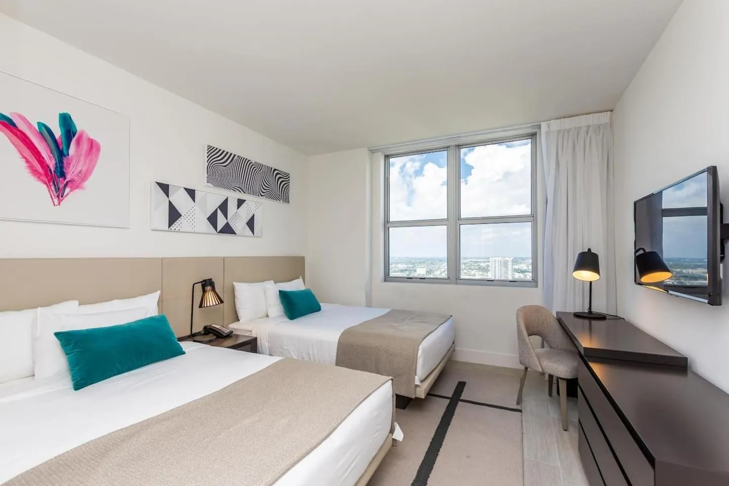 Bed in Amazing Apartments at H Beach House