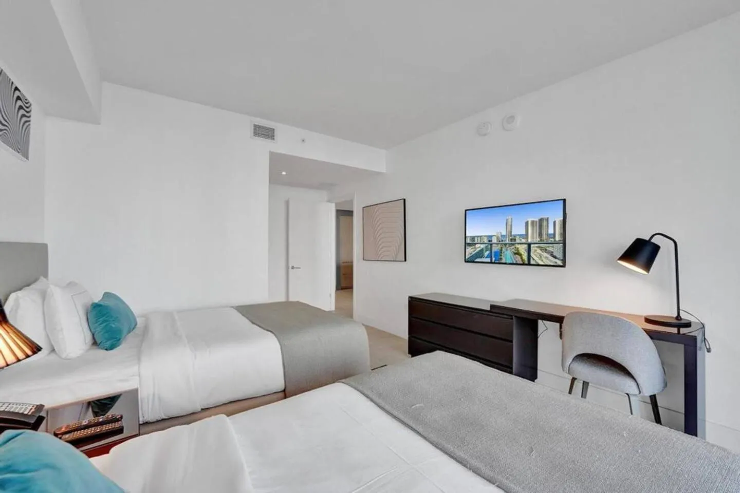 Bed in Amazing Apartments at H Beach House