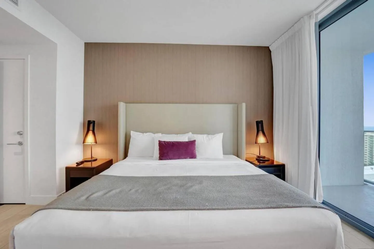 Bed in Amazing Apartments at H Beach House