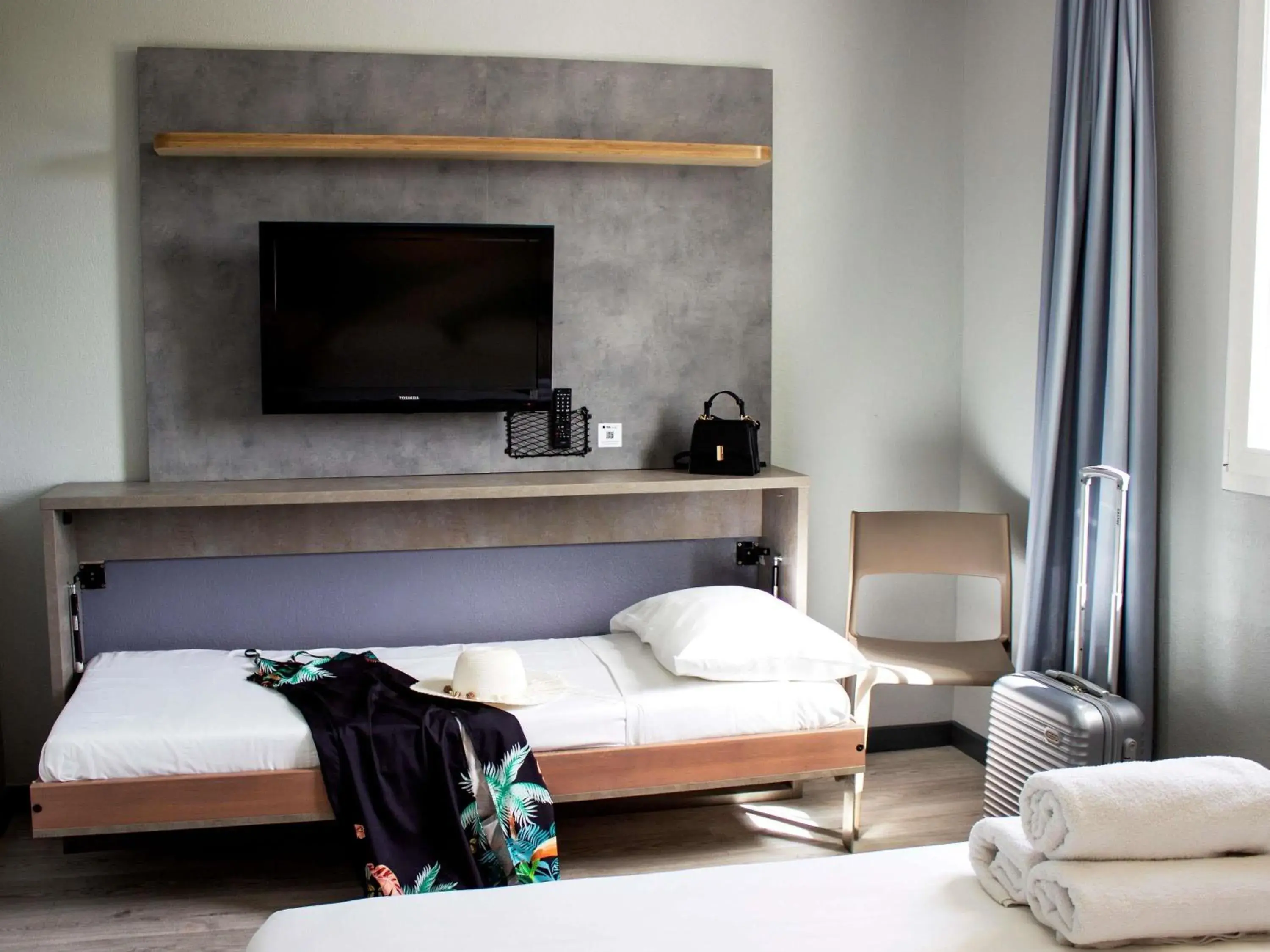 Property building, Bed in ibis budget Lunel Porte de Camargue Property building, Bed in ibis budget Lunel Porte de Camargue