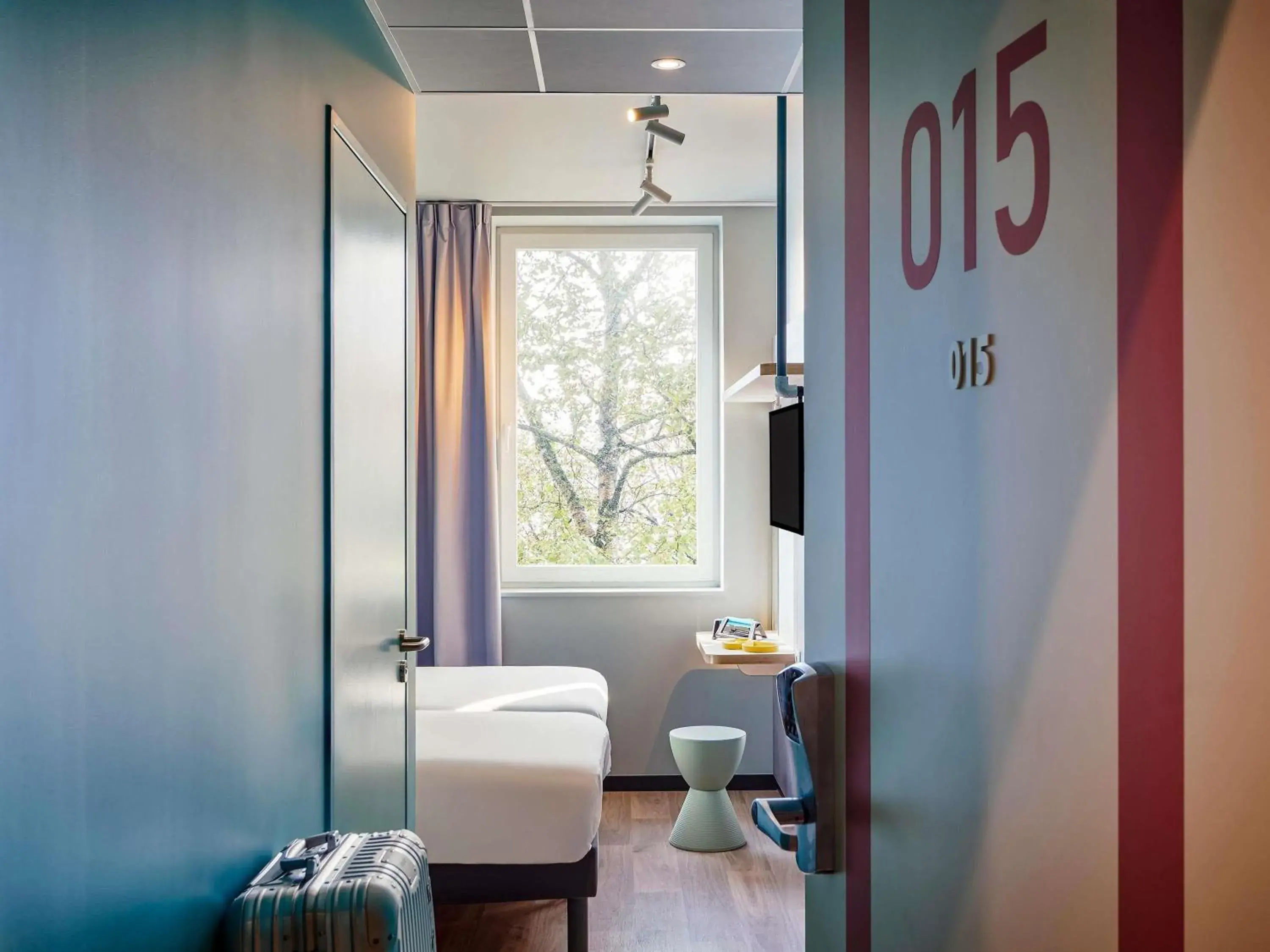 Bedroom in ibis budget Lunel Porte de Camargue Bedroom in ibis budget Lunel Porte de Camargue