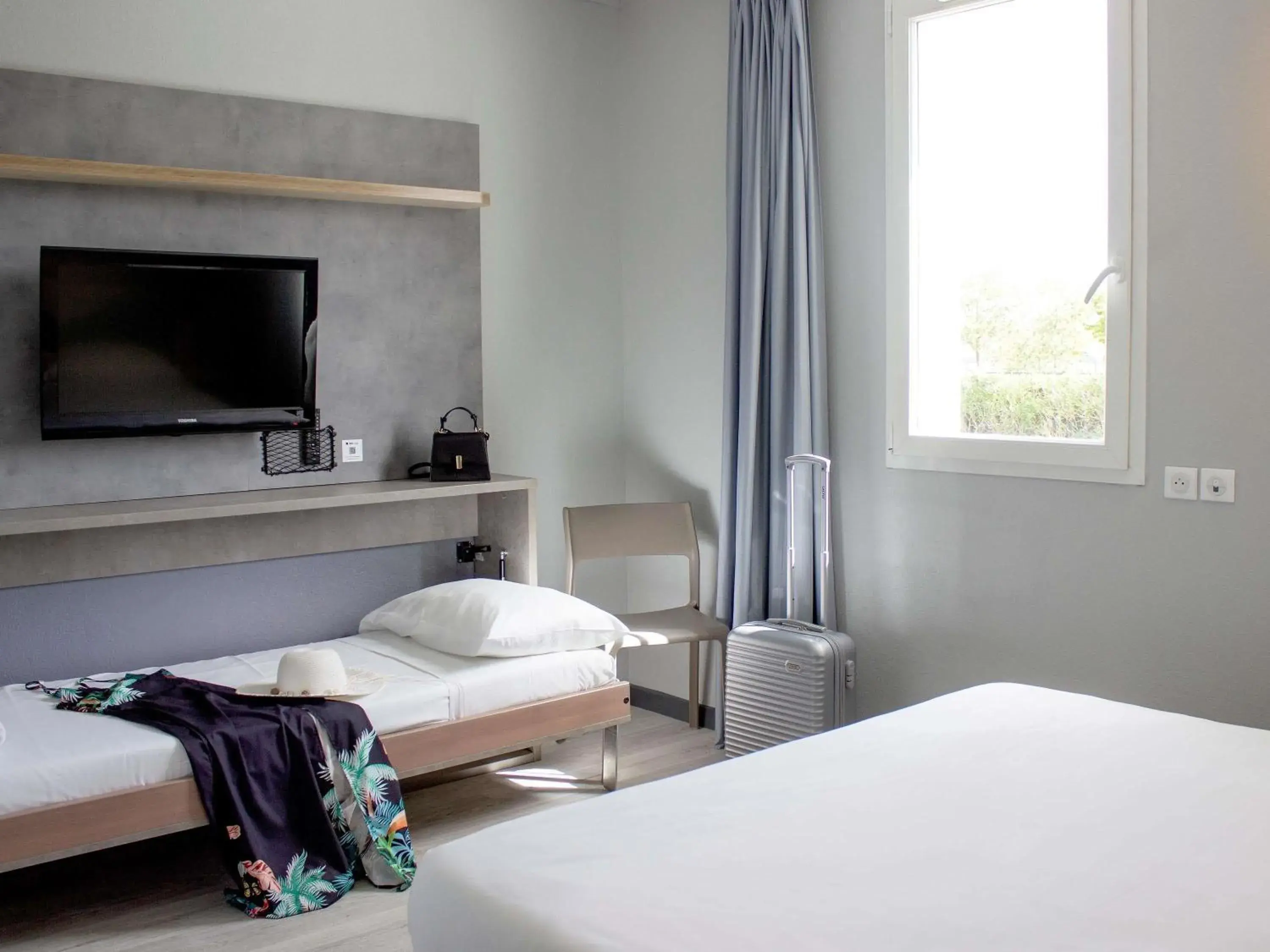 Bedroom, Bed in ibis budget Lunel Porte de Camargue Bedroom, Bed in ibis budget Lunel Porte de Camargue