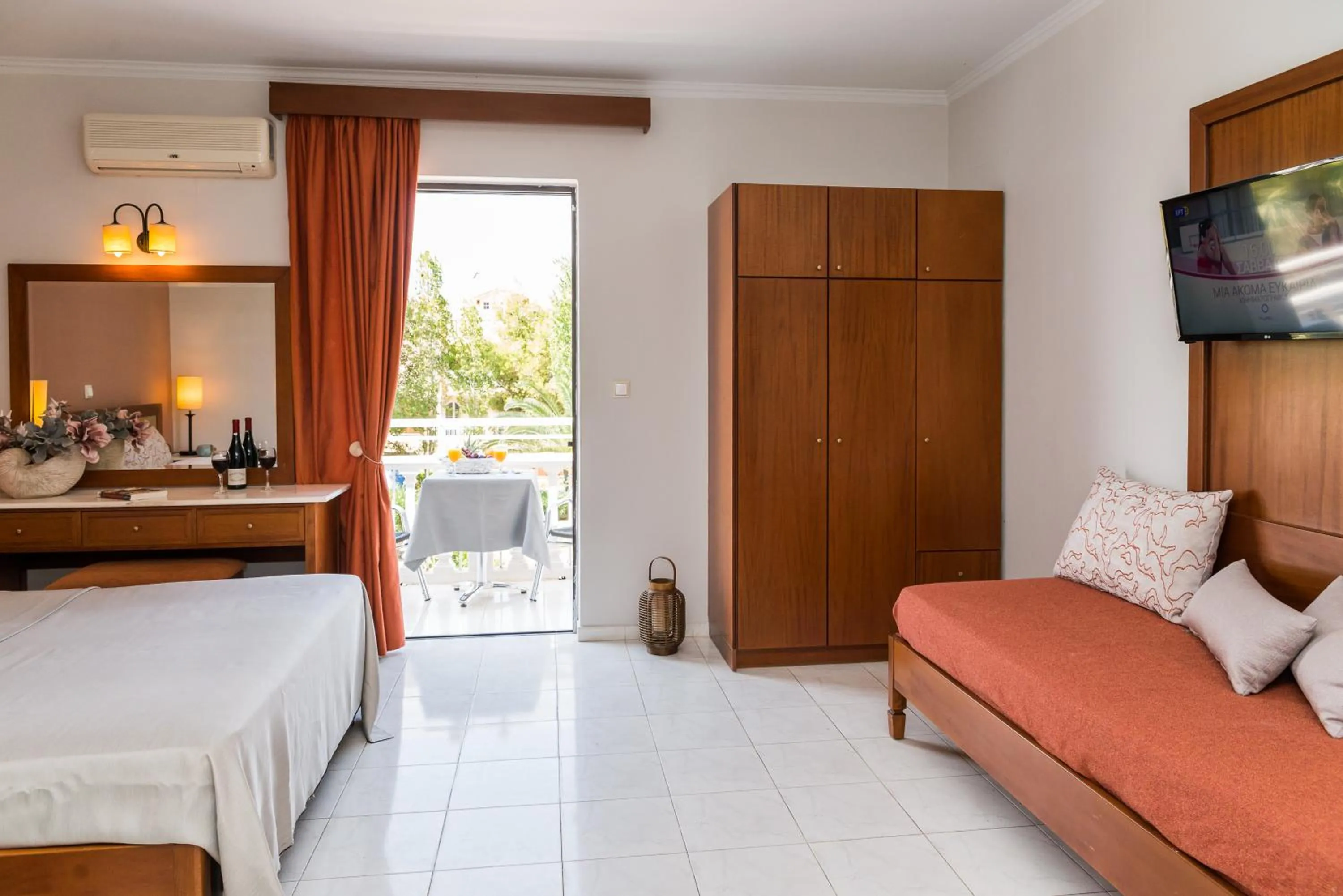 Seating area, Bed in Kalidonio Studios Zante