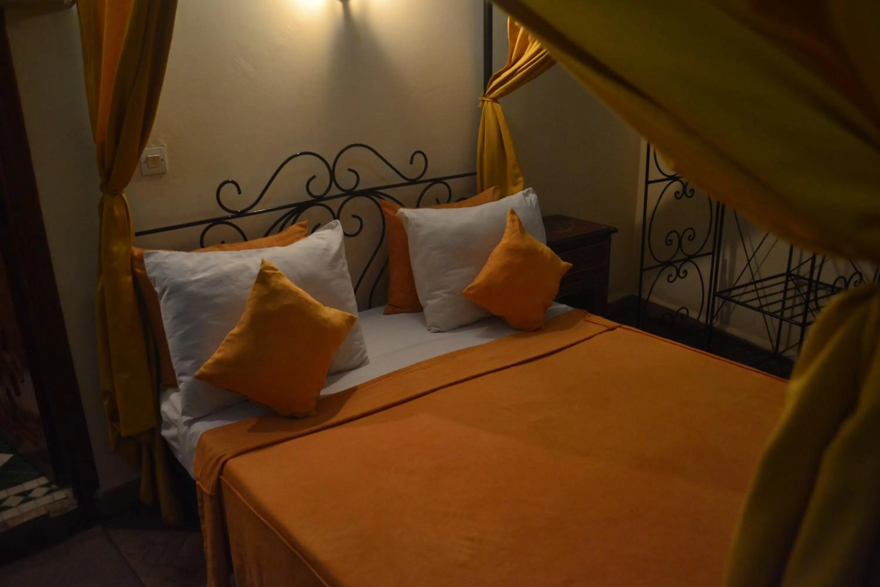 Bed in Riad Hôtel Belleville Marrakech