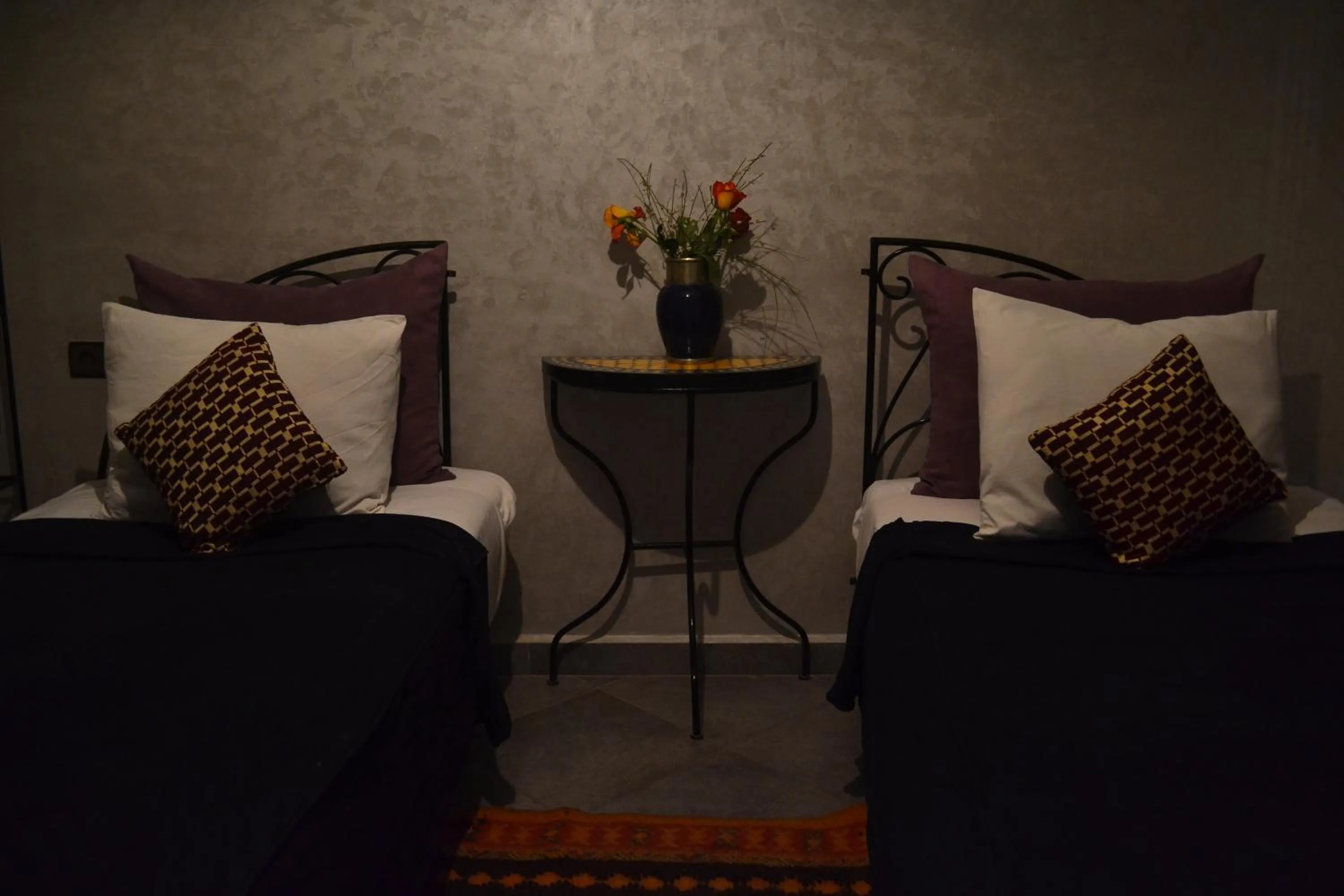 Bed in Riad Hôtel Belleville Marrakech