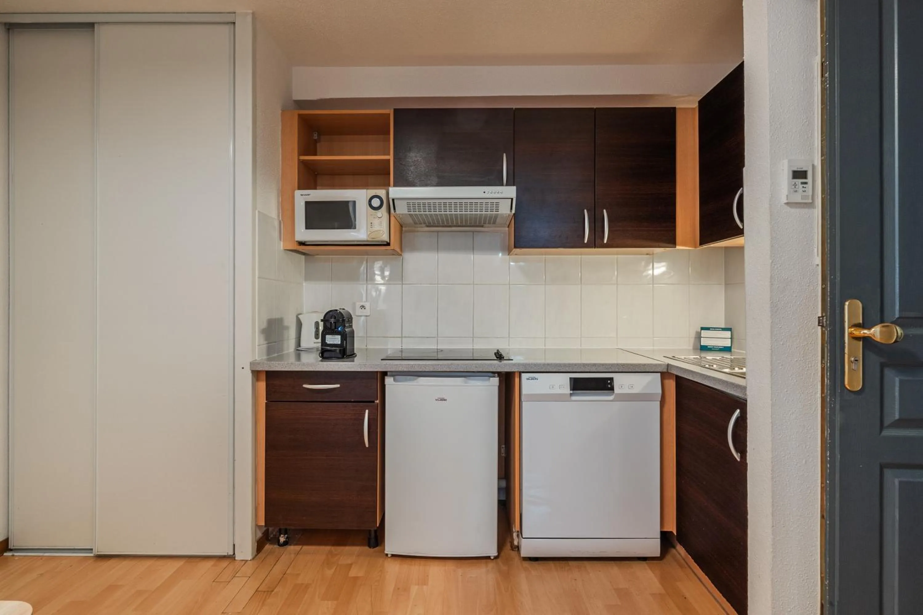 Kitchen or kitchenette in Residhotel Mulhouse Centre
