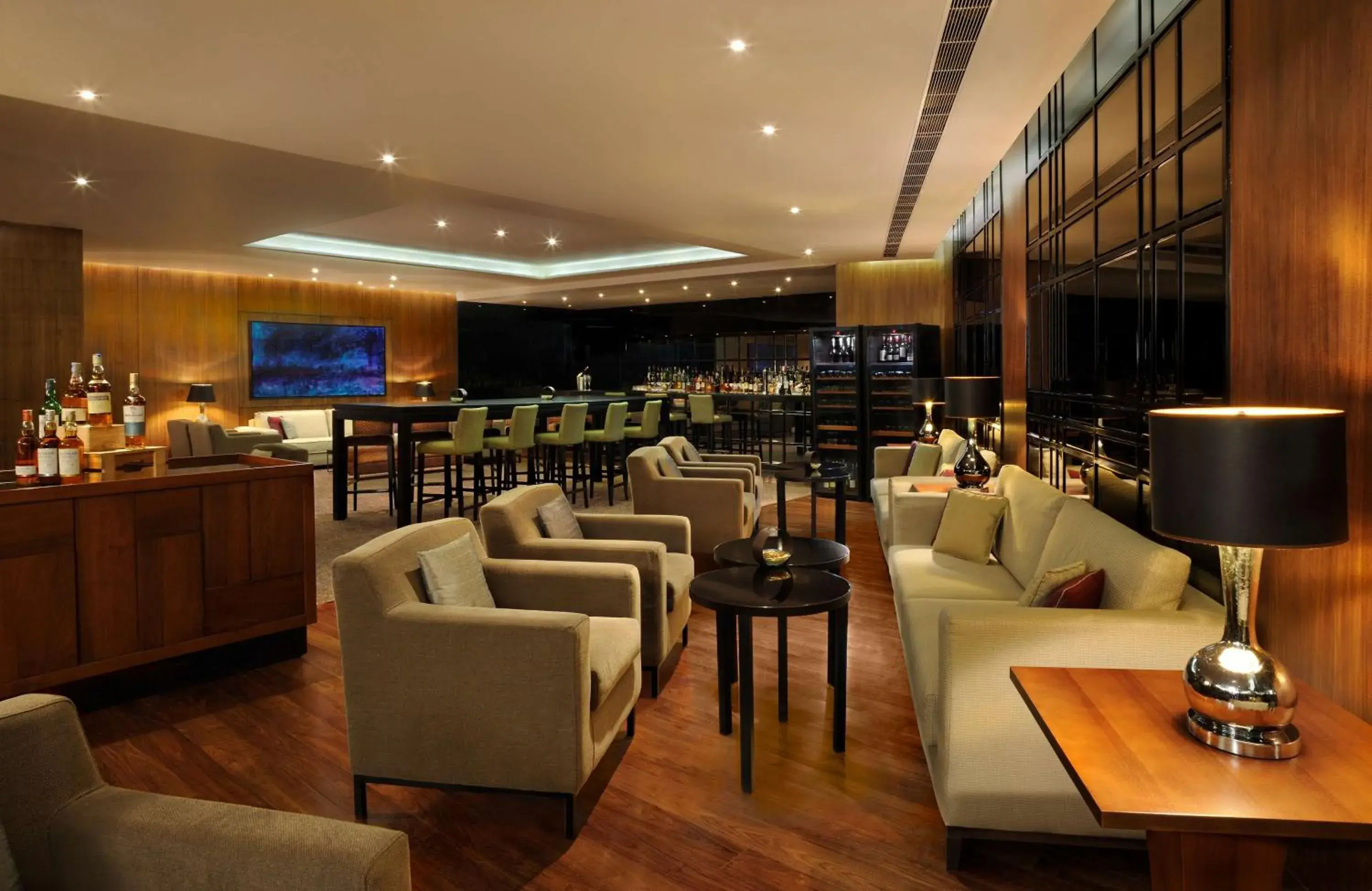Lounge or bar in Hilton Bangalore Embassy GolfLinks Lounge or bar in Hilton Bangalore Embassy GolfLinks