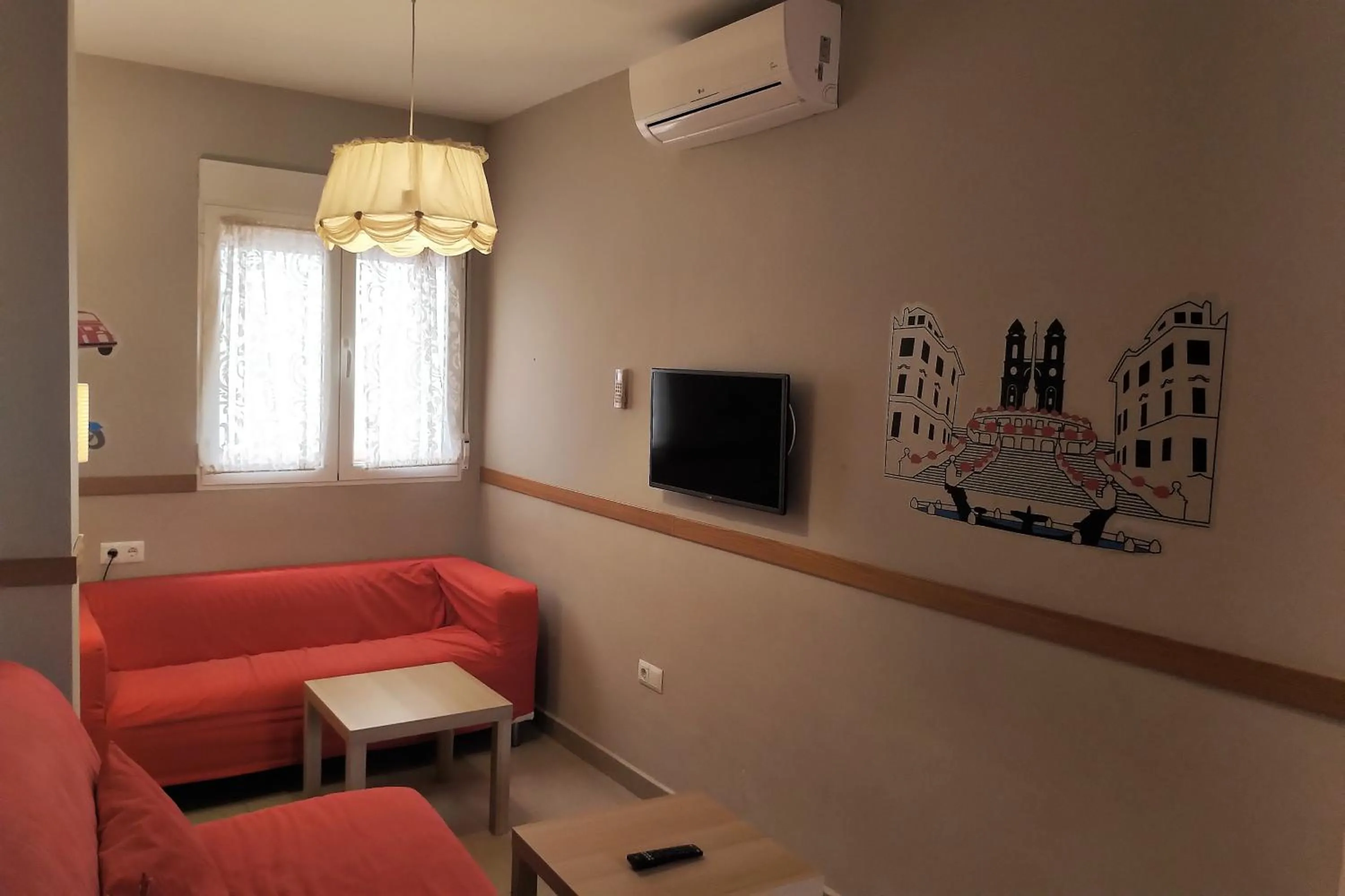 Living room in Apartamentos El Templo Suites