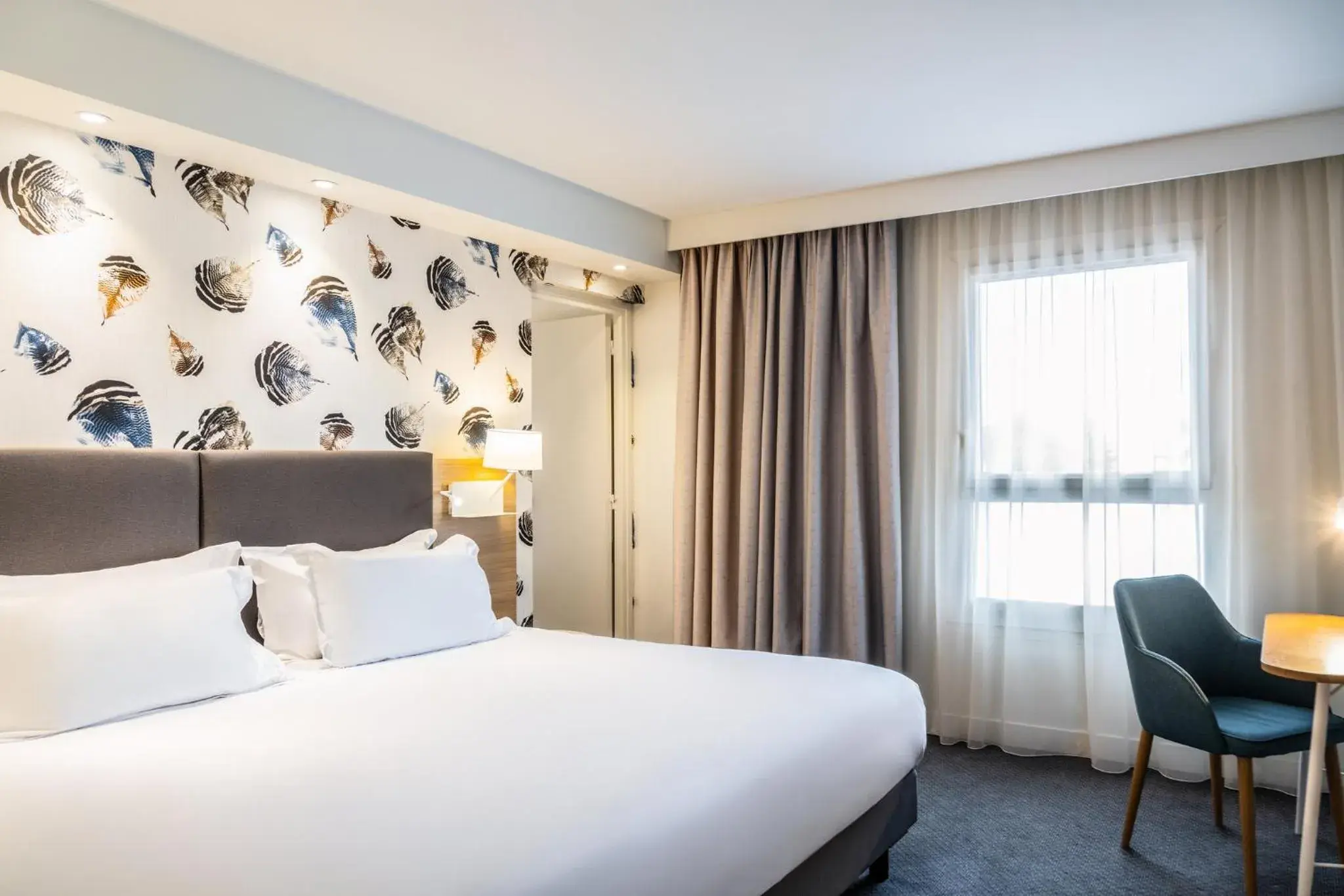 Photo of the whole room, Bed in Holiday Inn Perpignan by IHG Photo of the whole room, Bed in Holiday Inn Perpignan by IHG