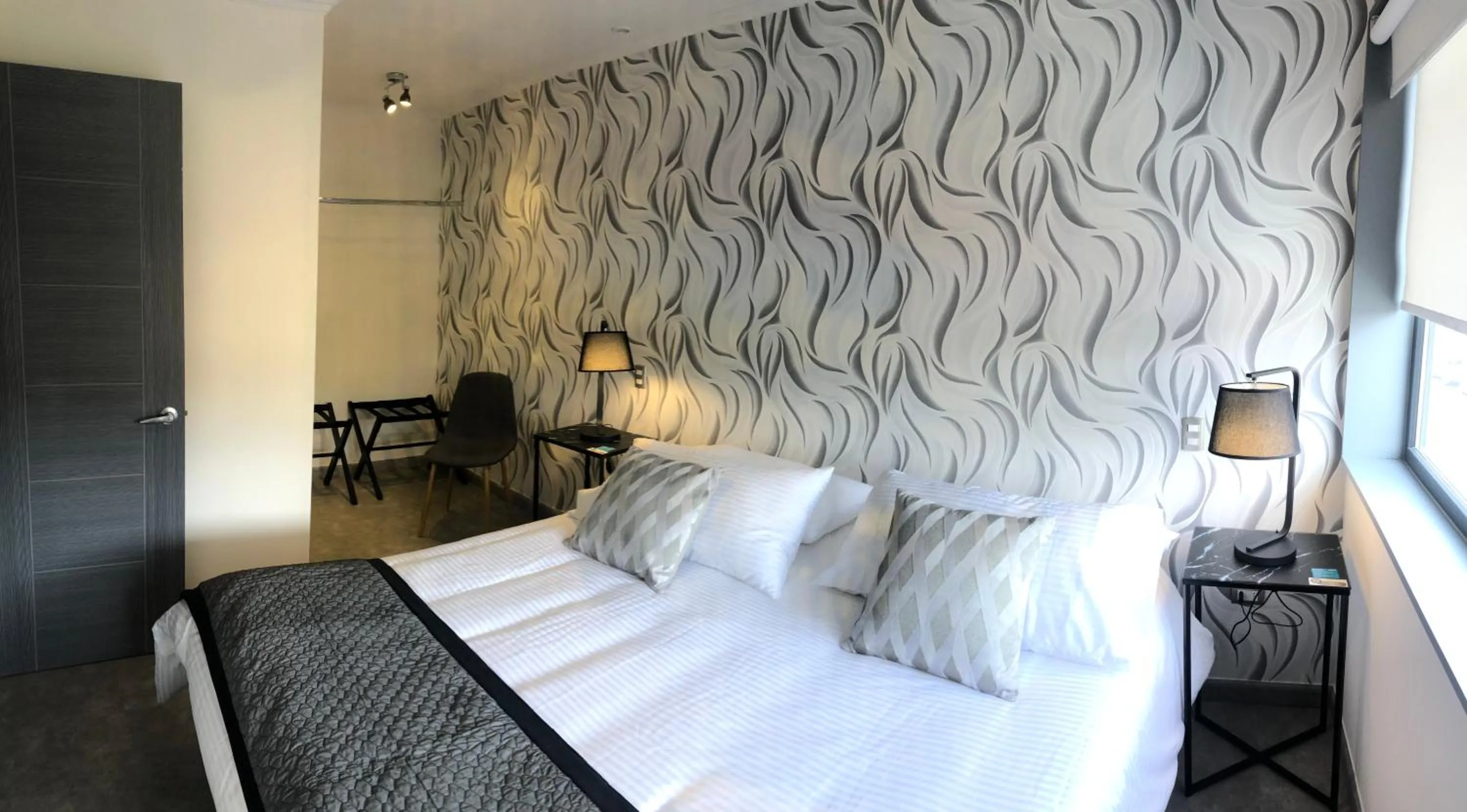 Photo of the whole room, Bed in Patagonia Hotel & Apart Suite