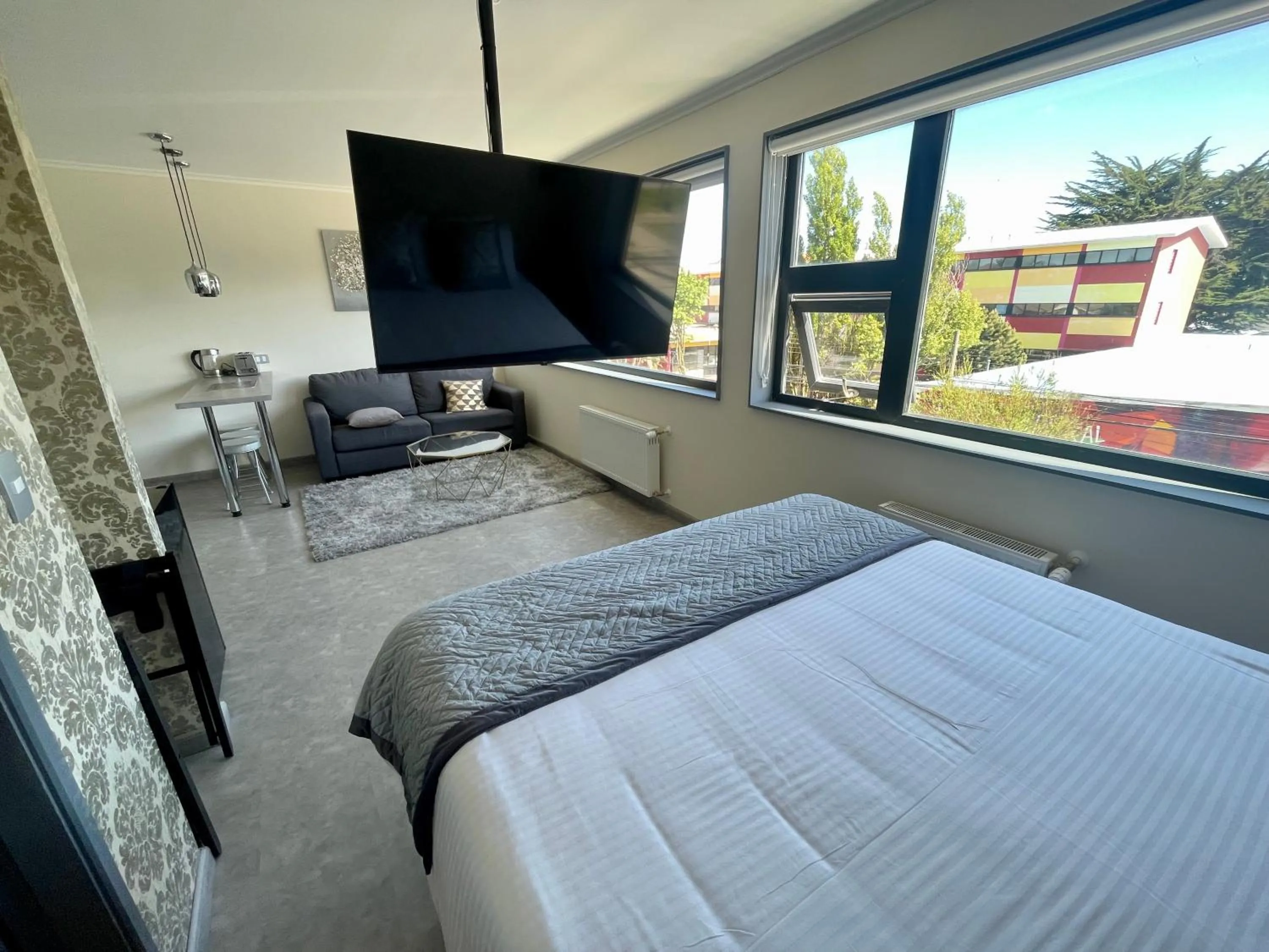 Bed in Patagonia Hotel & Apart Suite