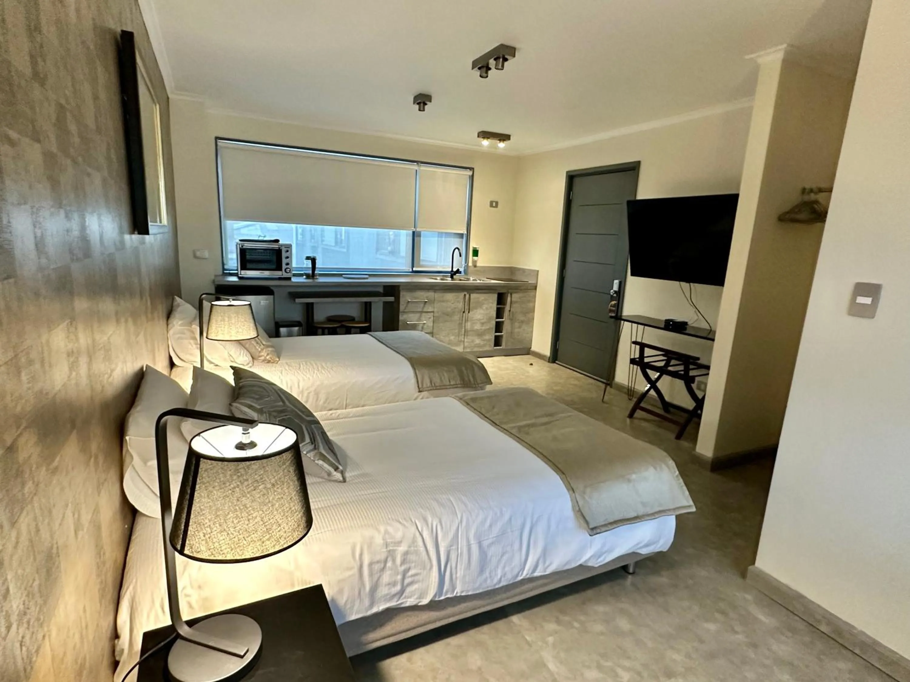 Photo of the whole room, Bed in Patagonia Hotel & Apart Suite